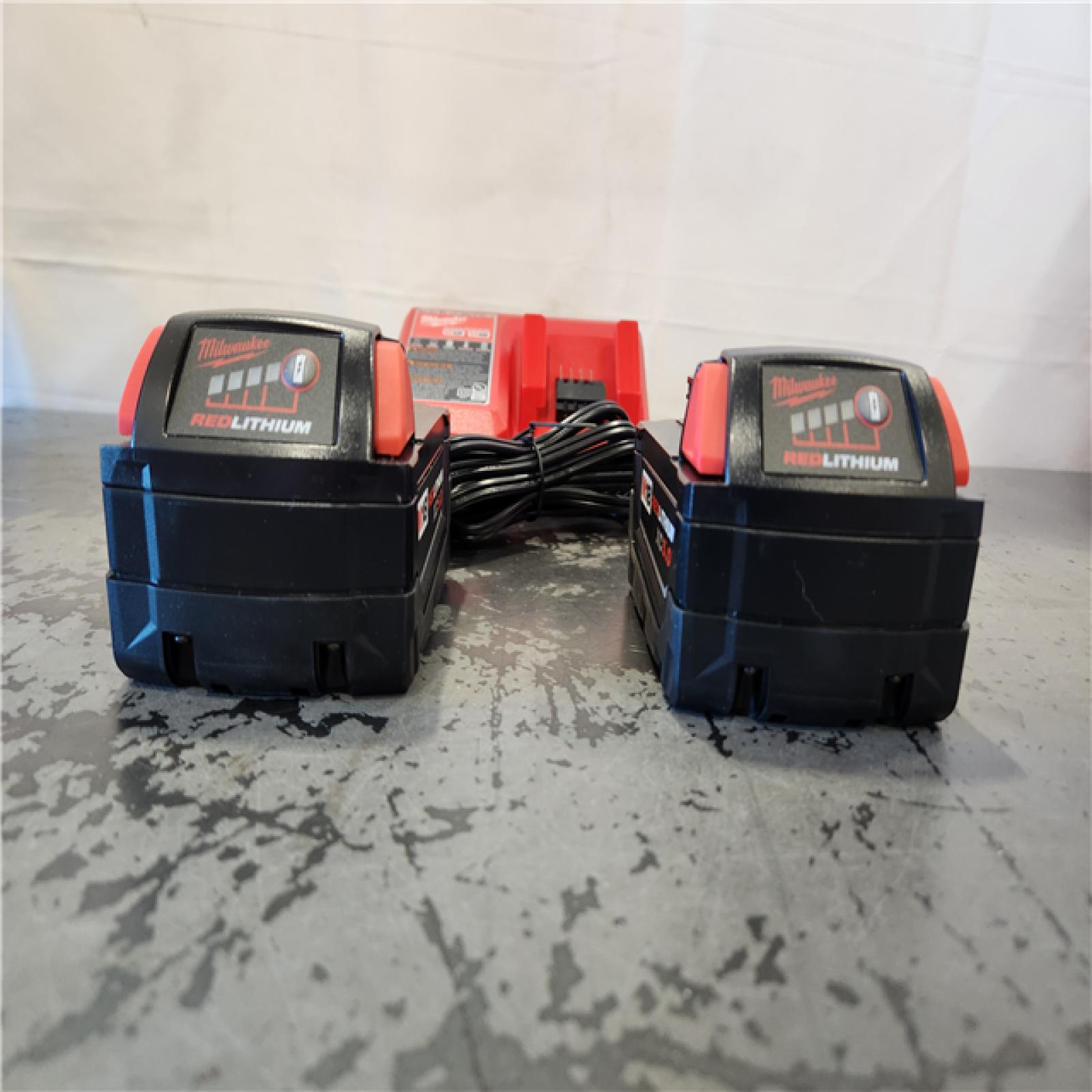 AS-IS- Milwaukee 18-Volt Lithium-Ion XC Starter Kit with Two 5.0Ah Batteries and Charger