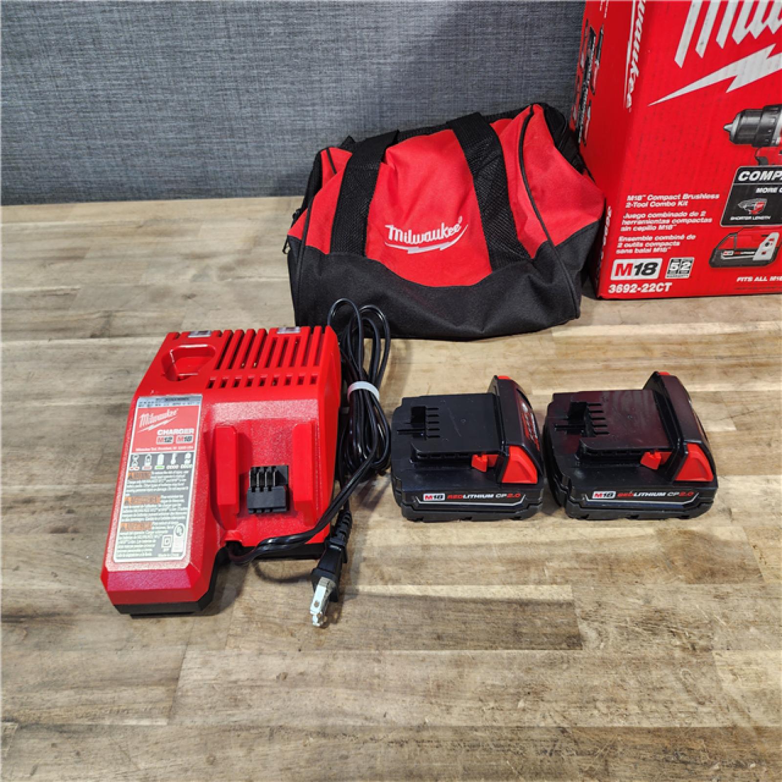 HOUSTON LOCATION - AS-IS Milwaukee M18 18V Lithium-Ion Brushless Cordless Compact Drill/Impact Combo Kit (2-Tool) W/(2) 2.0 Ah Batteries, Charger & Bag
