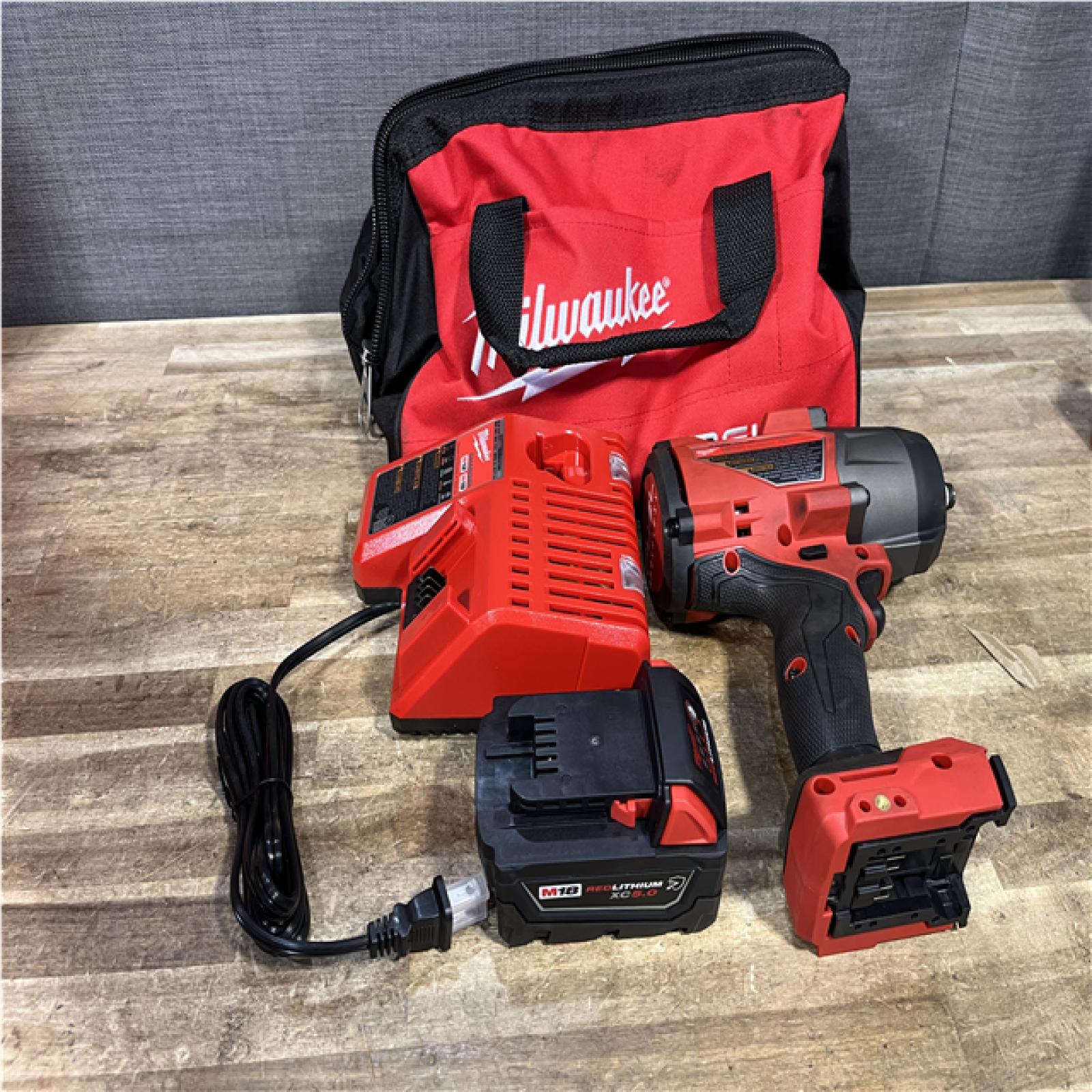 Houston Location AS-IS Milwaukee FUEL 18V Lithium-Ion Brushless Cordless 1/2 in. Impact Wrench w/Friction Ring Kit