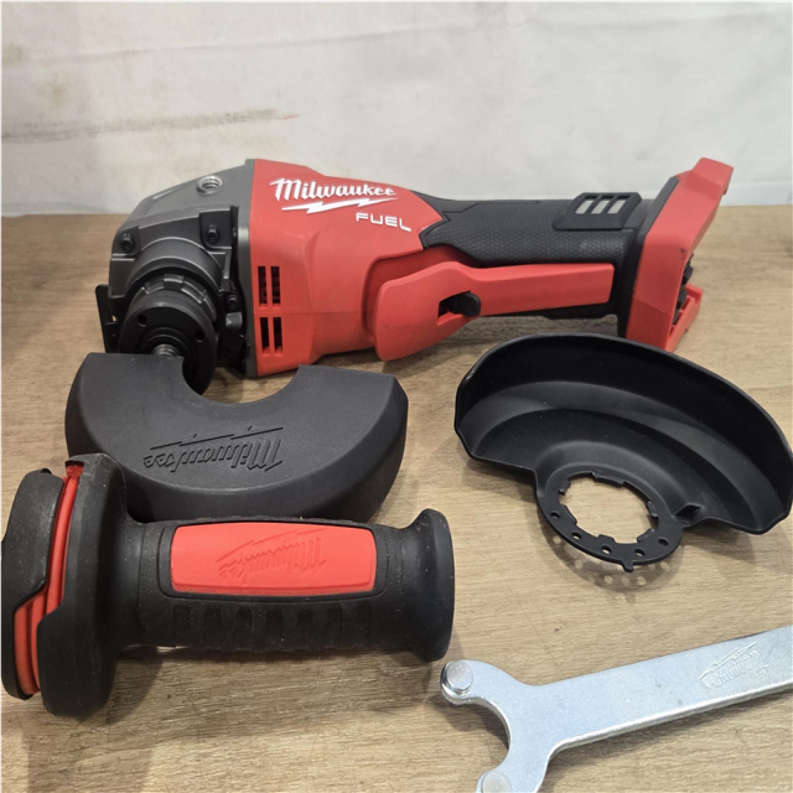 AS-IS Milwaukee FUEL 18V Lithium-Ion Brushless Cordless 4-1/2 in./5 in. Grinder with Variable Speed & Paddle Switch (Tool-Only)