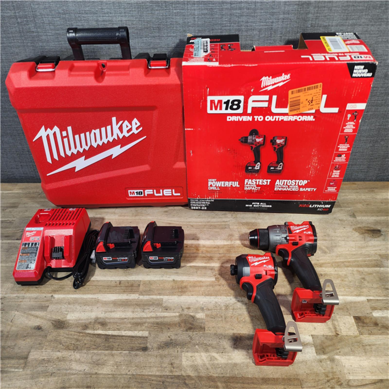 HOUSTON LOCATION - AS-IS (APPEARS LIKE NEW) MILWAUKEE FUEL 18V Lithium-Ion Brushless Cordless Hammer Drill and Impact Driver Combo Kit (2-Tool) with 2 Batteries