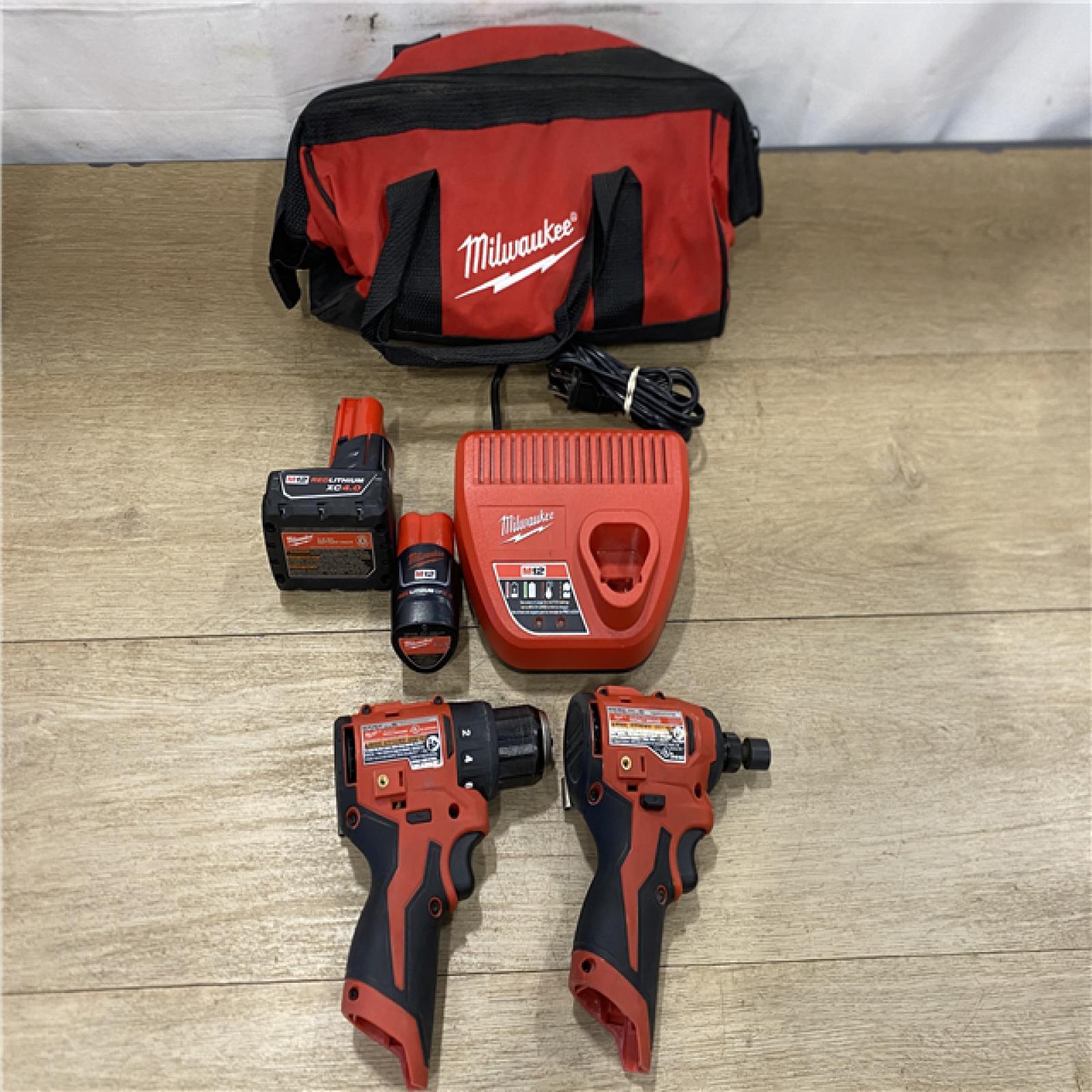 AS-IS Milwaukee FUEL 12-Volt Lithium-Ion Brushless Cordless Hammer Drill and Impact Driver Combo Kit