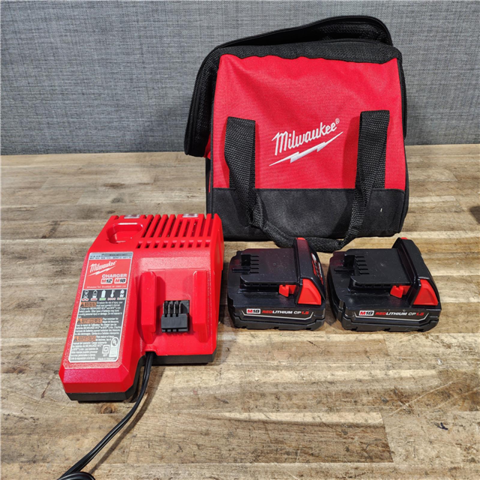 HOUSTON LOCATION - AS-IS Milwaukee  18V Lithium-Ion Cordless Drill Driver/Impact Driver Combo Kit