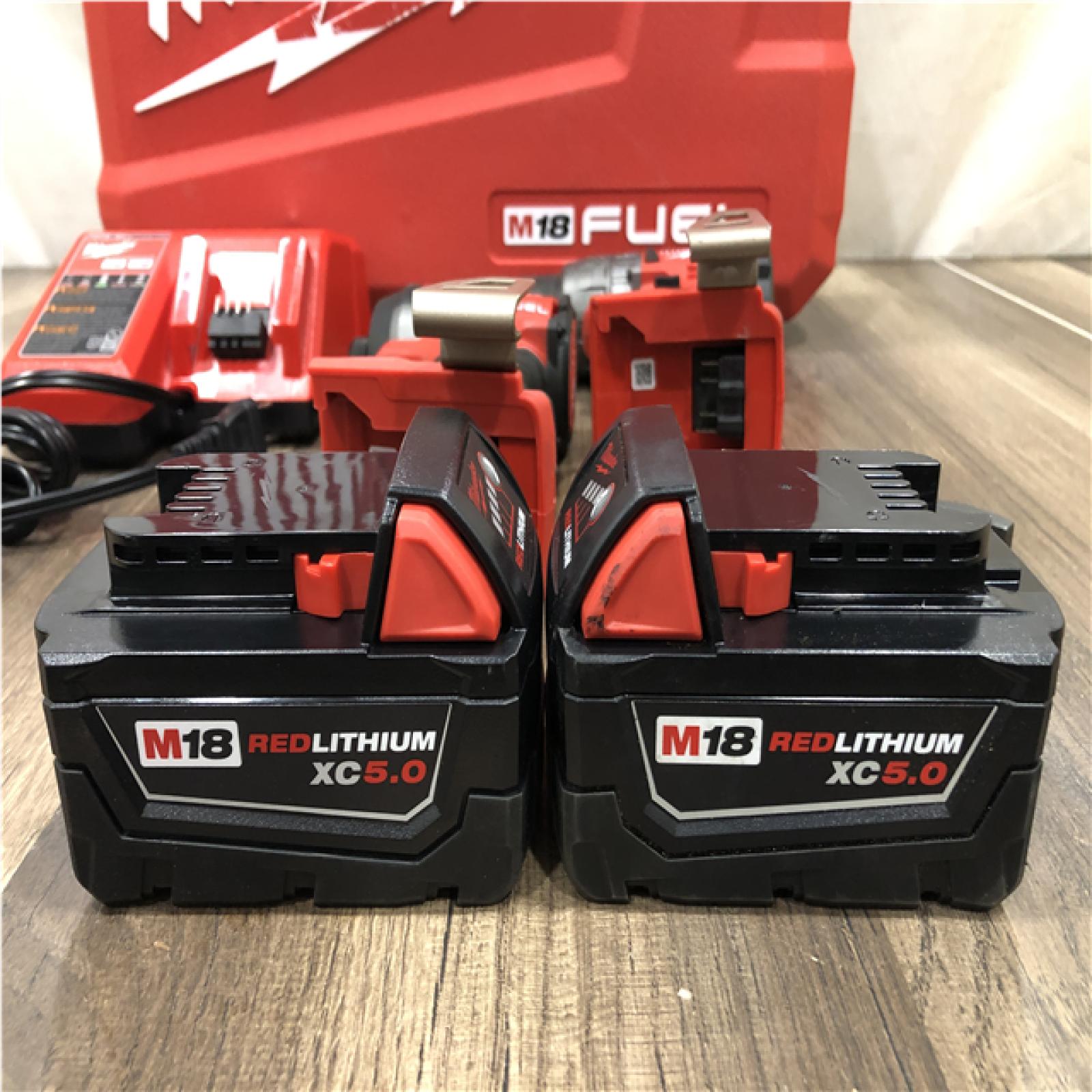 AS-IS VMilwaukee FUEL 18V Lithium-Ion Brushless Cordless Hammer Drill and Impact Driver Combo Kit