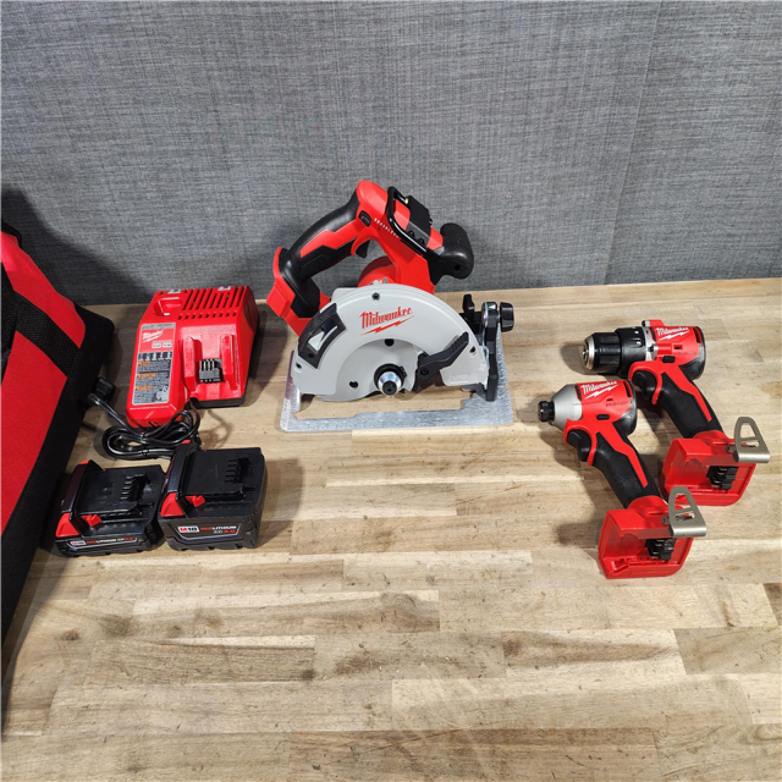 HOUSTON LOCATION - AS-IS Milwaukee M18 18-Volt Lithium-Ion Brushless Cordless Combo Kit (3-Tool) with 2-Batteries, 1-Charger and Tool Bag