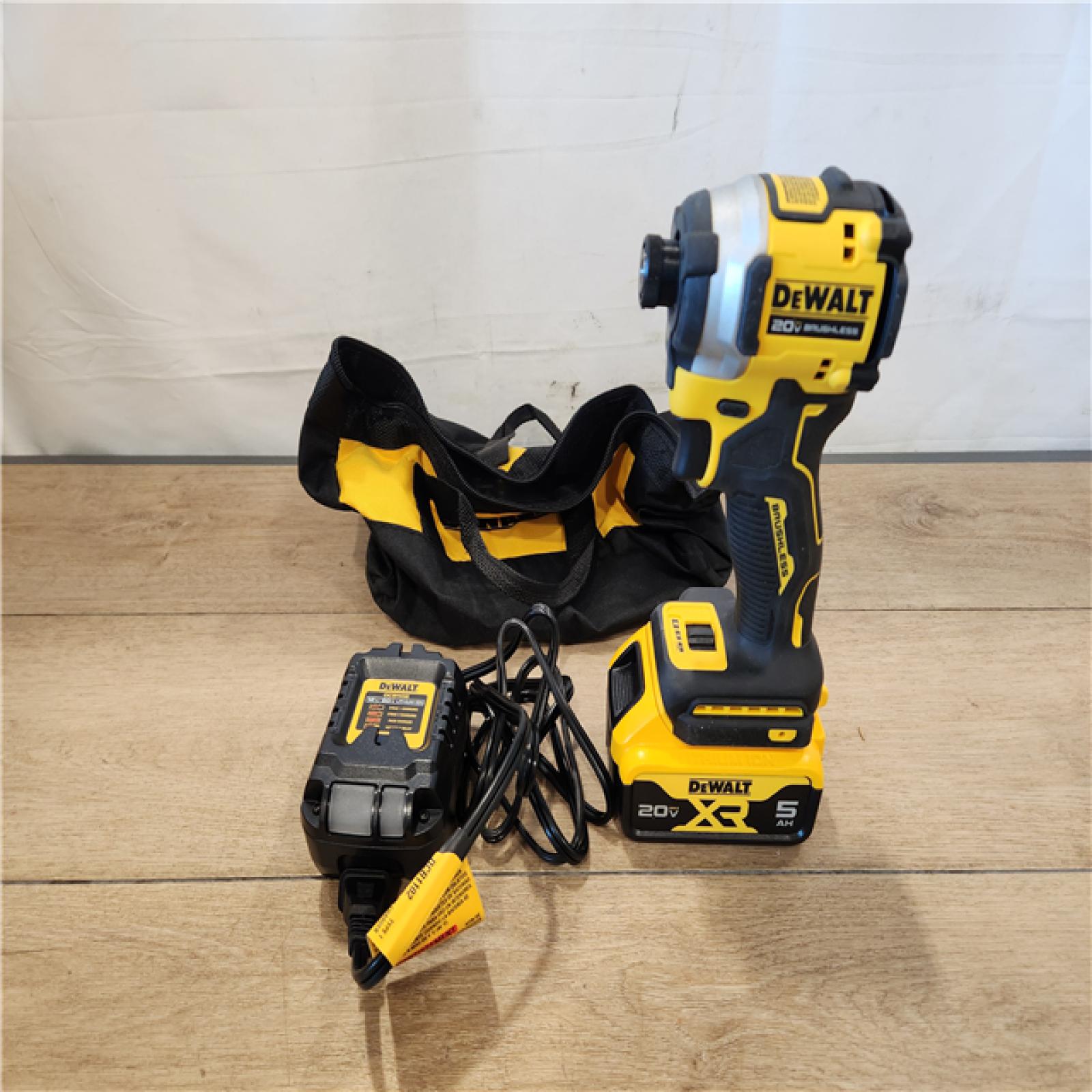 AS-IS- DEWALT ATOMIC 20V MAX Lithium-Ion Cordless 1/4 in. Brushless Impact Driver Kit  5 Ah Battery  Charger  and Bag
