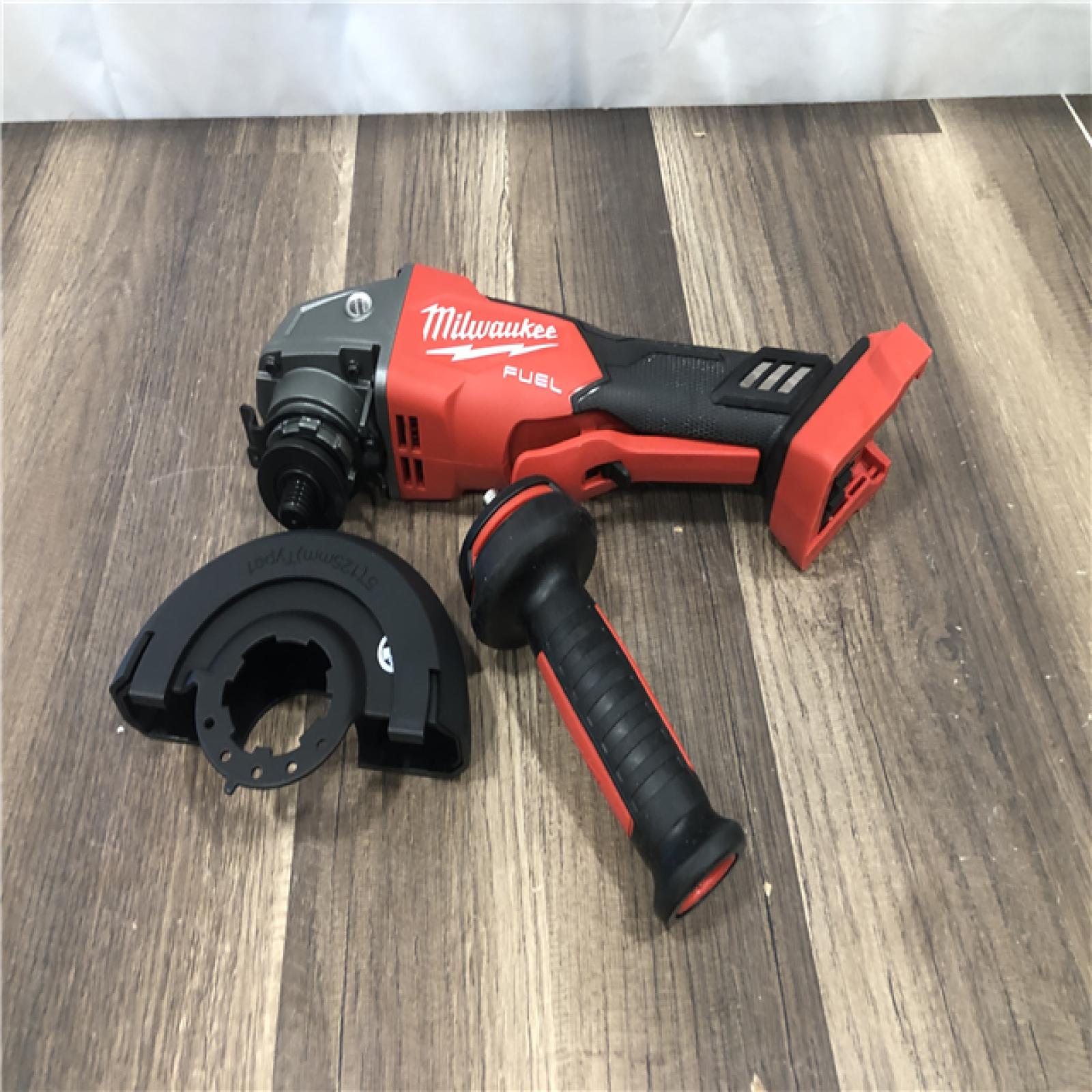 AS-IS Milwaukee FUEL 18V Lithium-Ion Brushless Cordless 4-1/2 in./5 in. Grinder w/Paddle Switch (Tool-Only)