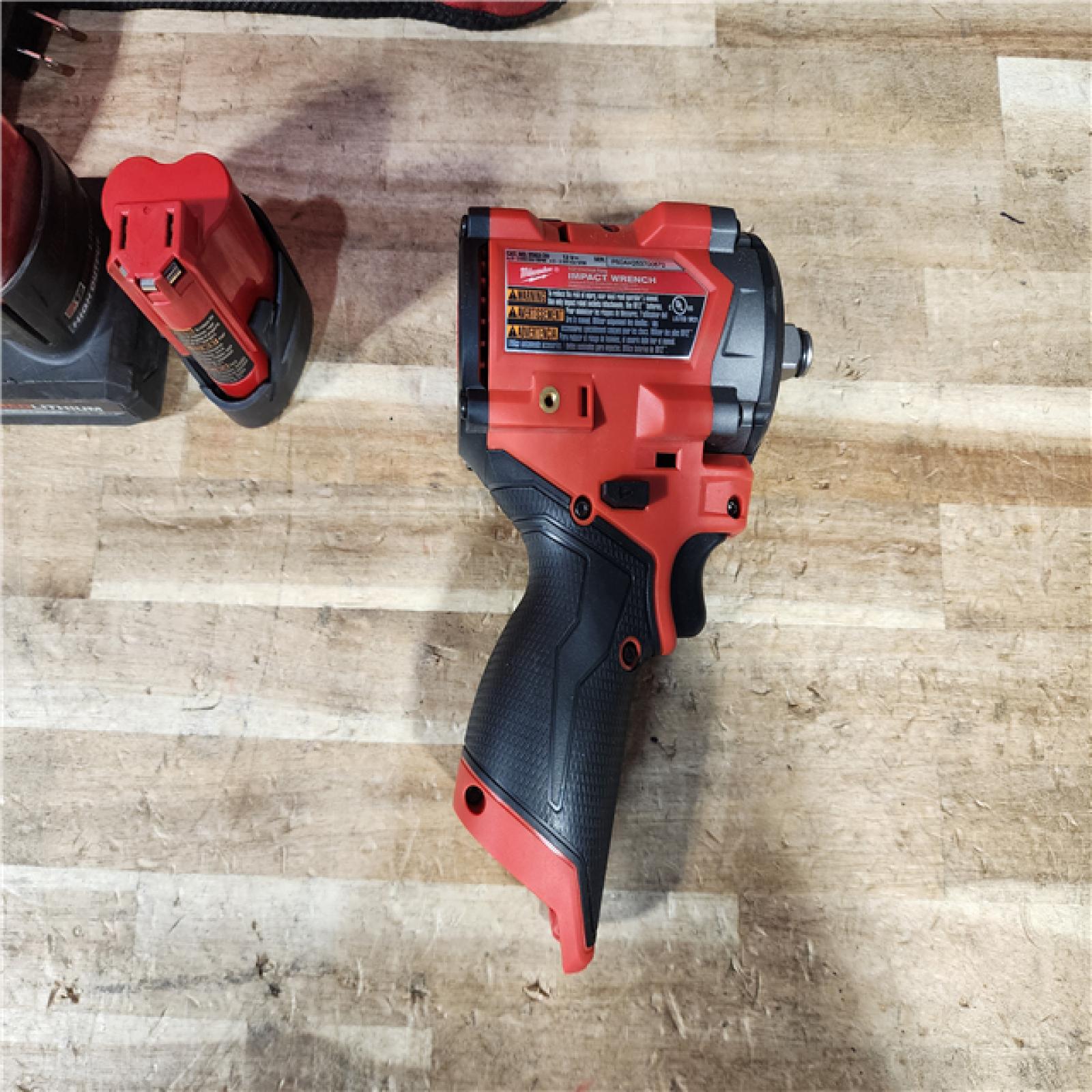 HOUSTON LOCATION - AS - IS Milwaukee FUEL 12V Li-Ion Brushless Cordless Stubby 1/2 in. Impact Wrench Kit