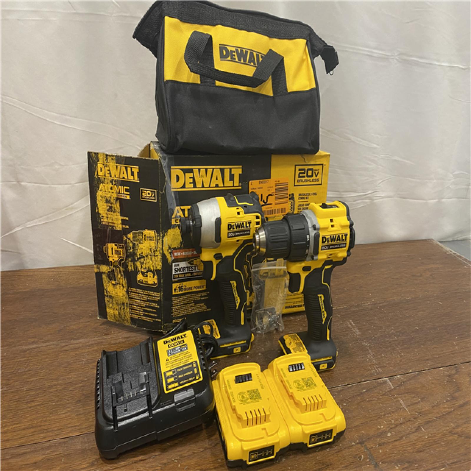 AS-IS Dewalt DCK225D2 20V MAX ATOMIC Brushless Compact Lithium-Ion 1/2 in. Cordless Drill Driver and 1/4 in. Impact Driver Combo Kit with 2 Batteries 2 Ah