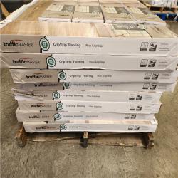 Phoenix TrafficMaster Khaki Oak 4 MIL x 6 in. W x 36 in. L Grip Strip Water Resistant Luxury Vinyl Plank Flooring (1 152 sqft/ 48 case)