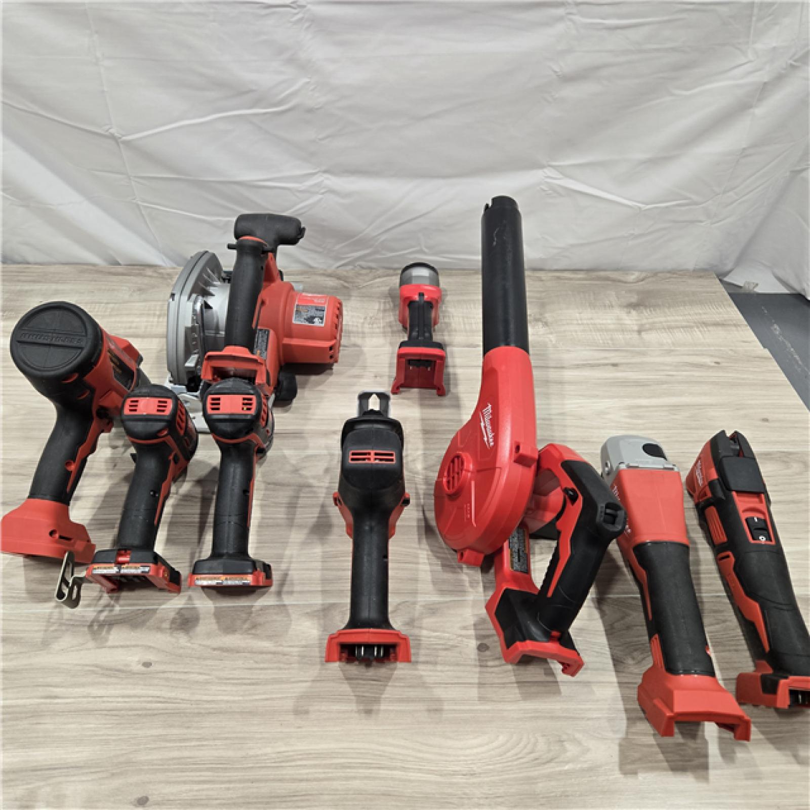 AS-IS M18 18-Volt Lithium-Ion Cordless Combo Kit (9-Tool) with (2) Batteries, Charger, and Tool Bag