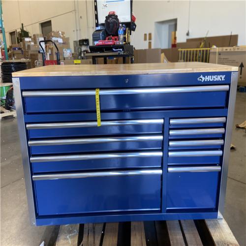 DALLAS LOCATION - Husky 52 in. W x 25 in. D 10-Drawer Mobile Workbench Tool Chest with Solid Wood Work Top in Gloss Blue