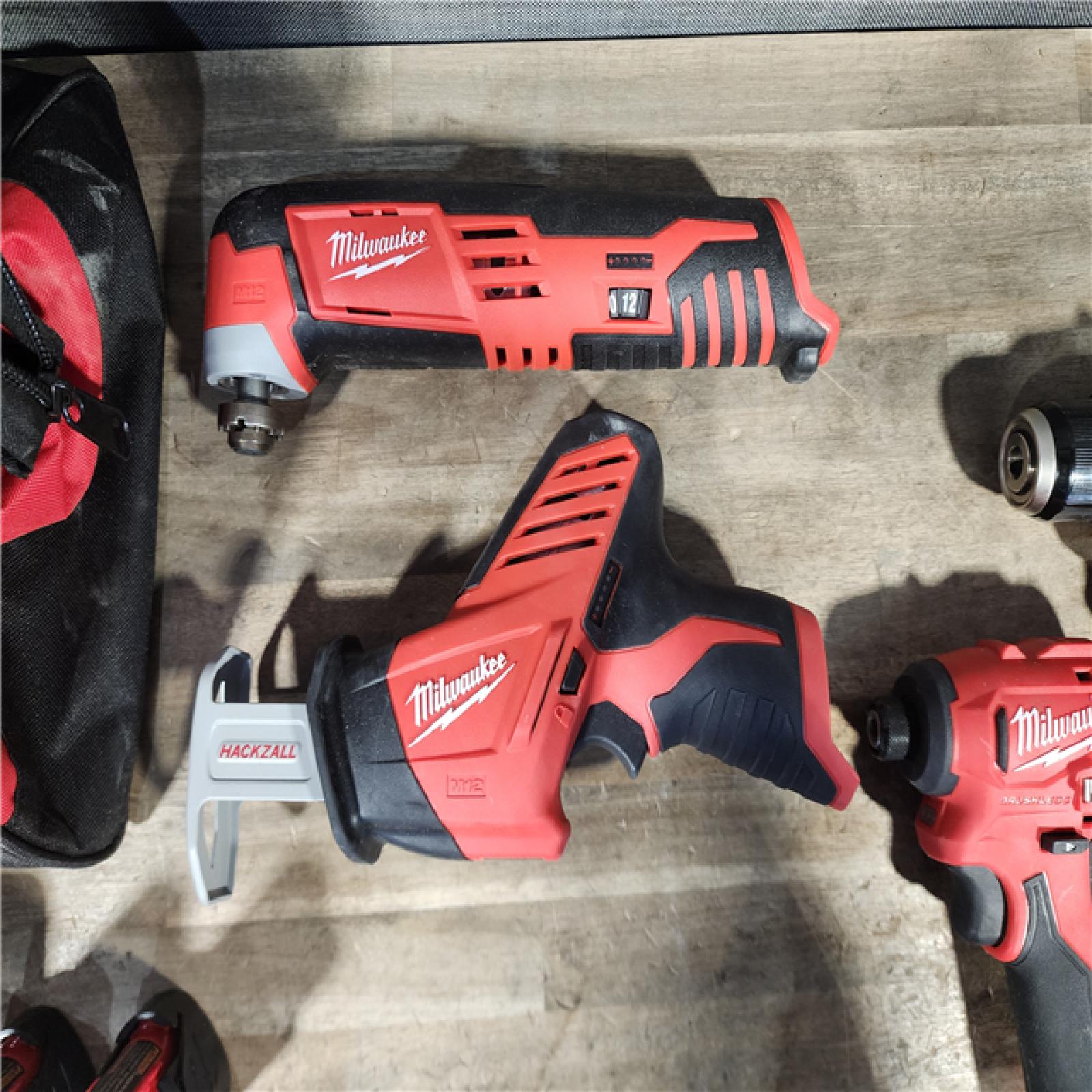 HOUSTON LOCATION - AS-IS MILWAUKEE 4 TOOL COMBO KIT W/ (2) BATTERY & CHARGER