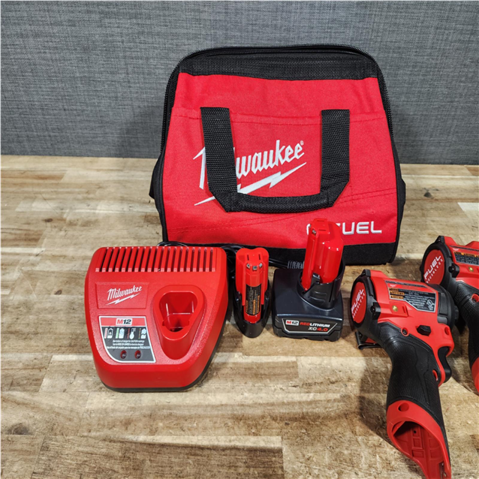 HOUSTON LOCATION - AS - IS Milwaukee FUEL 12-Volt Lithium-Ion Brushless Cordless Hammer Drill and Impact Driver Combo Kit