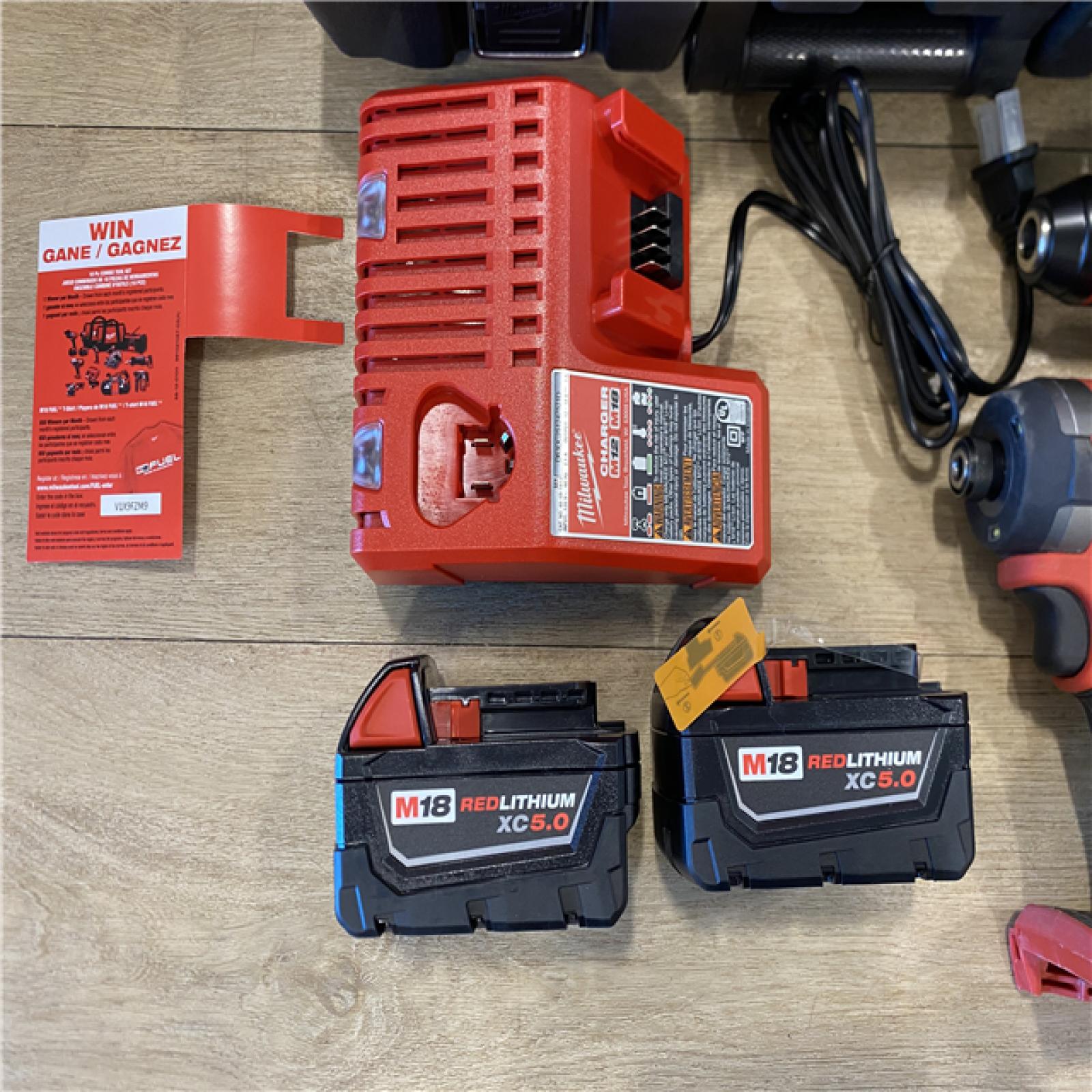 AS-IS Milwaukee FUEL 18V Lithium-Ion Brushless Cordless Hammer Drill and Impact Driver Combo Kit