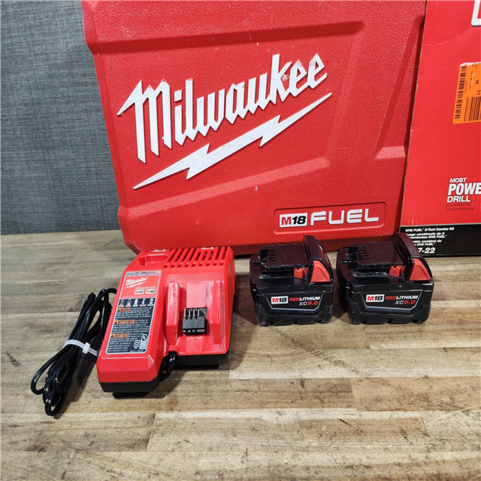 HOUSTON LOCATION - AS-IS Milwaukee  FUEL 18V Lithium-Ion Brushless Cordless Hammer Drill and Impact Driver Combo Kit