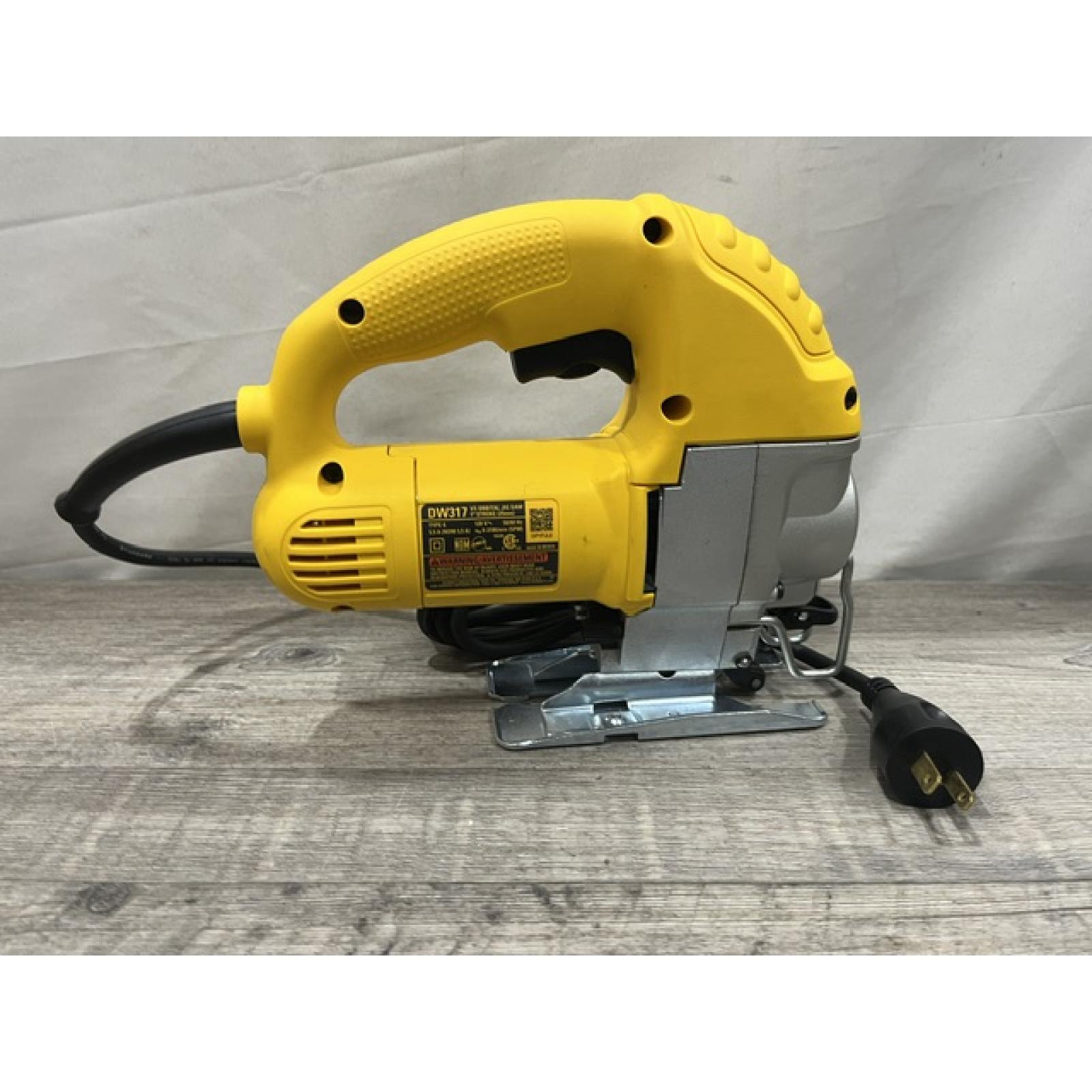 AS-IS DEWALT 5.5 Amp Corded Variable Speed Jig Saw With Bag