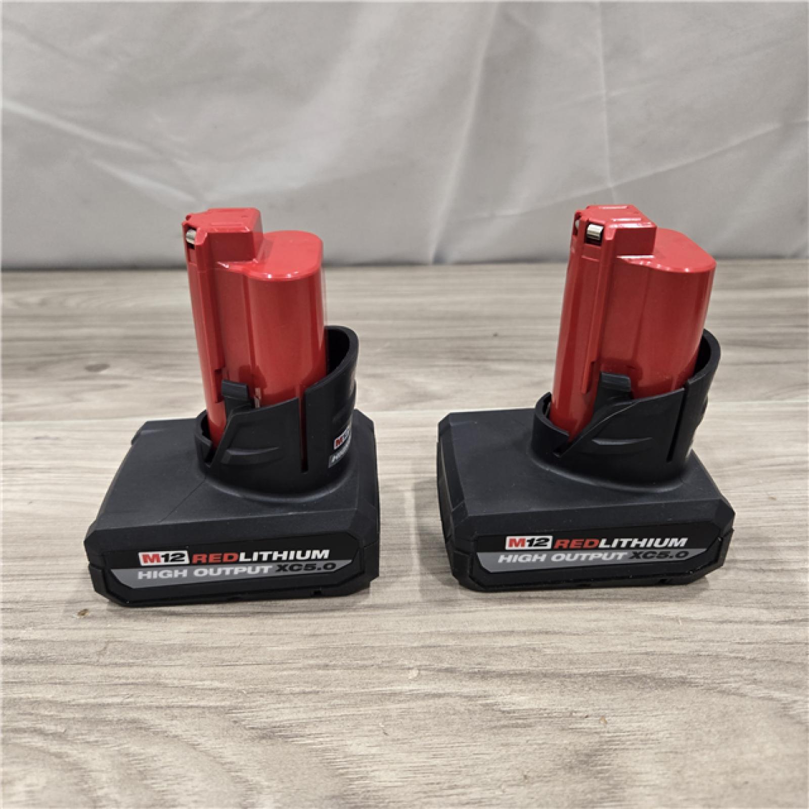 AS-IS Milwaukee M12 12V Lithium-Ion XC High Output 5.0 Ah Battery Pack (2-Pack) Starter Kit