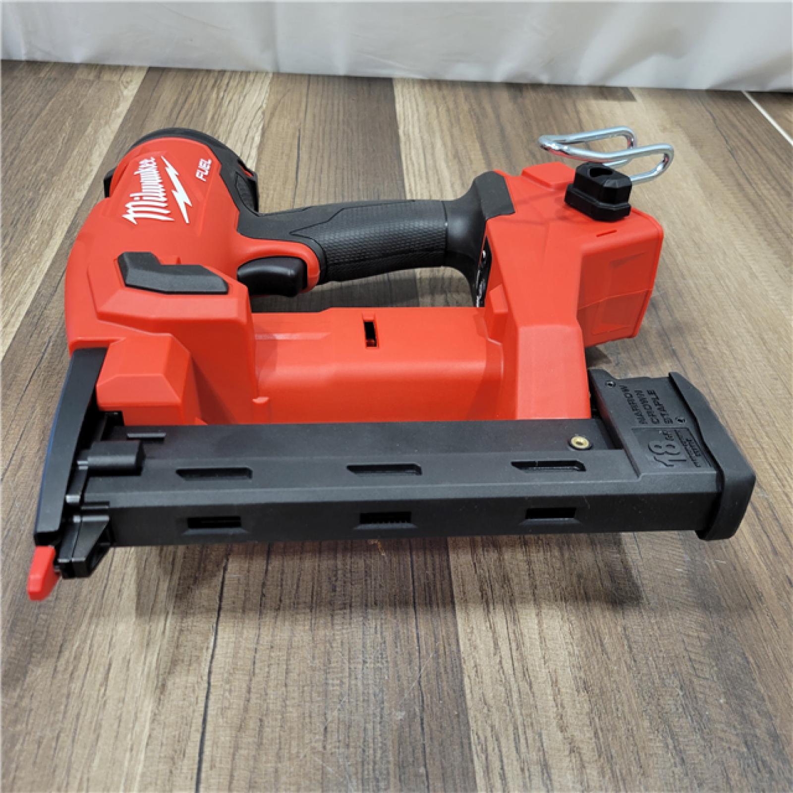 AS-IS  MILWAUKEE M18 FUEL 18-Volt Lithium-Ion Brushless Cordless 18-Gauge 1/4 in. Narrow Crown Stapler (Tool-Only)