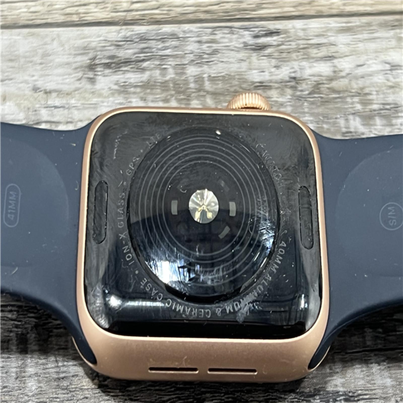 AS-IS Apple Watch Series SE (GPS,LTE 40mm) - Gold Aluminum Case/Navy Blue Sport Band - WR-50 METERS