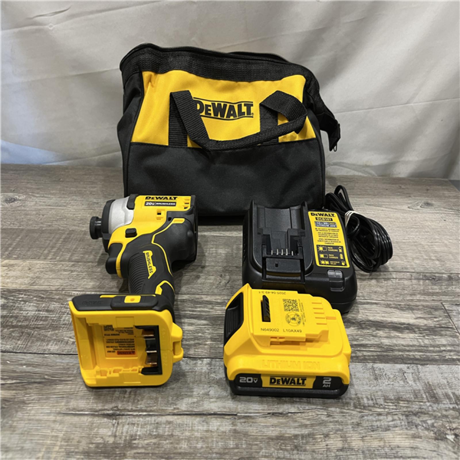 AS-IS DEWALT Atomic 20V Max Lithium-Ion Brushless Cordless Compact 1/4 in. Impact Driver Kit