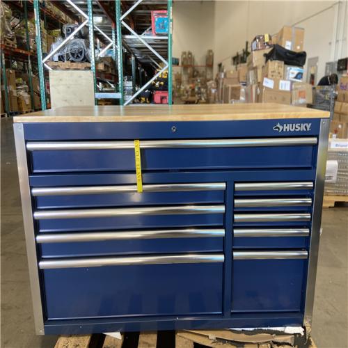 DALLAS LOCATION - Husky 52 in. W x 25 in. D 10-Drawer Mobile Workbench Tool Chest with Solid Wood Work Top in Gloss Blue