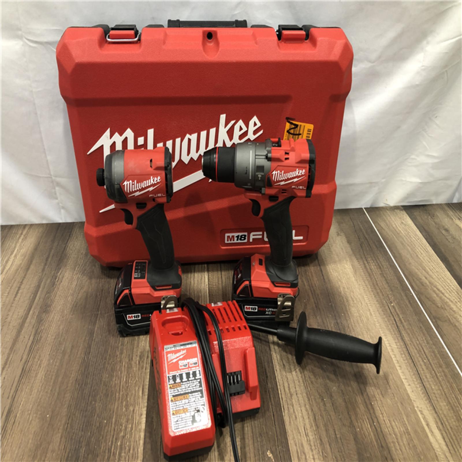 AS-IS Milwaukee FUEL 18V Lithium-Ion Brushless Cordless Hammer Drill and Impact Driver Combo Kit