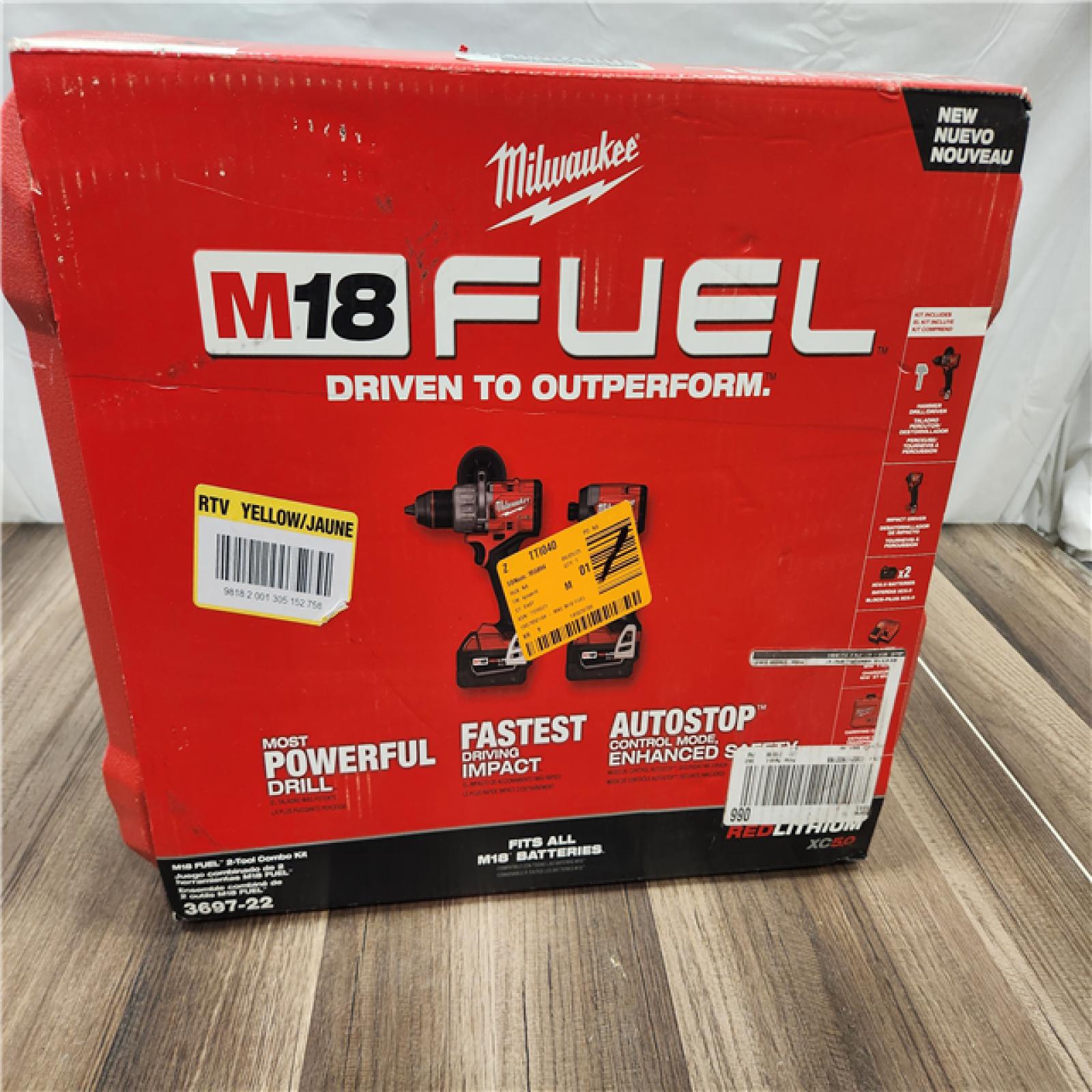 AS-IS  Milwaukee M18 FUEL 18V Lithium-Ion Brushless Cordless Hammer Drill and Impact Driver Combo Kit (2-Tool) with 2 Batteries
