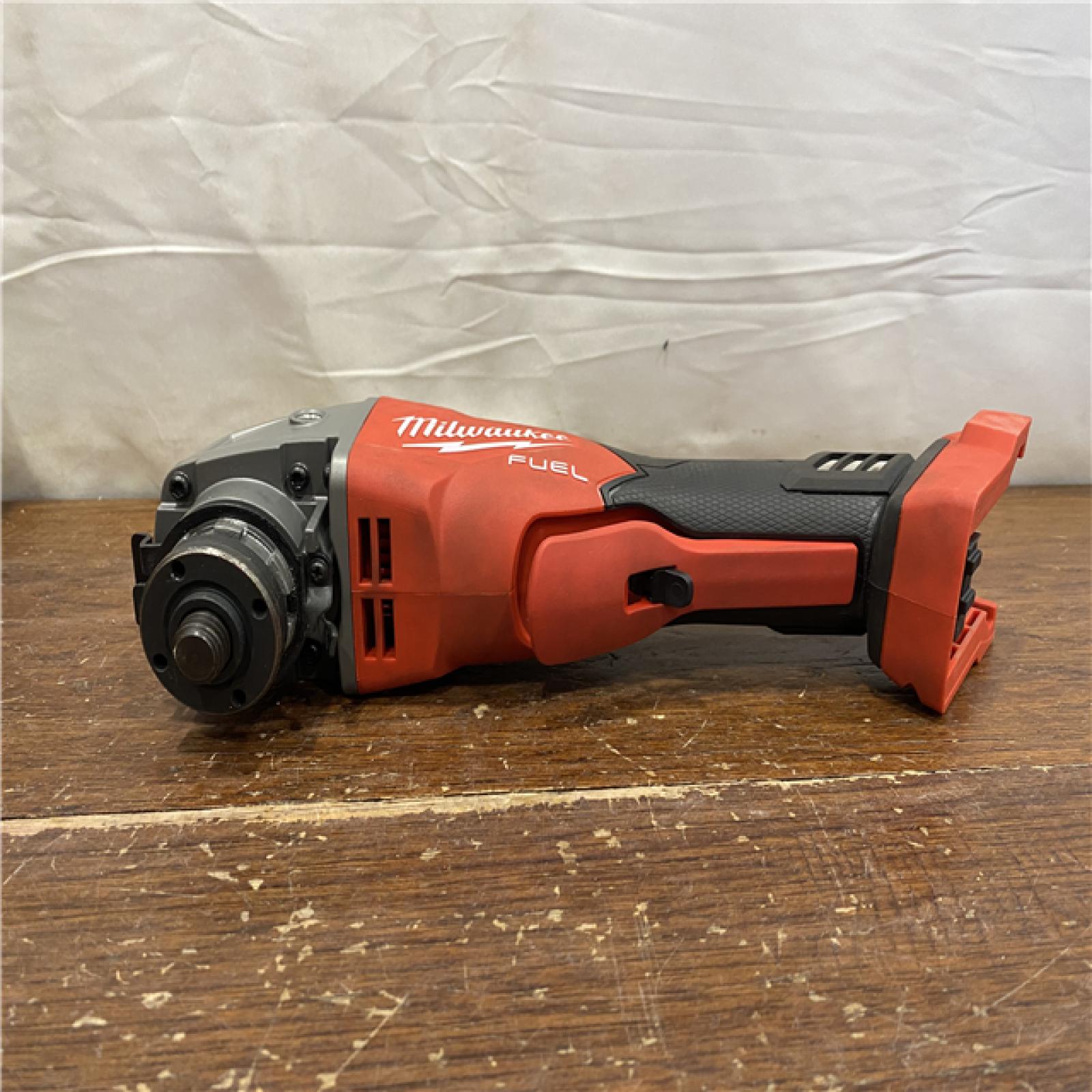 AS-IS AS-IS Milwaukee 2880-20 M18 FUEL 18-Volt Lithium-Ion Brushless Cordless 4-1/2 in./5 in. Grinder W/Paddle Switch (Tool-Only)