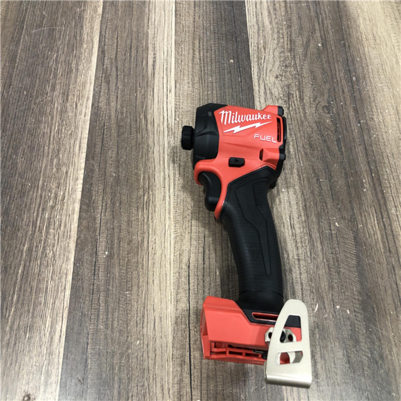 AS-IS Milwaukee FUEL SURGE 18V Lithium-Ion Brushless Cordless 1/4 in. Hex Impact Driver (Tool-Only)