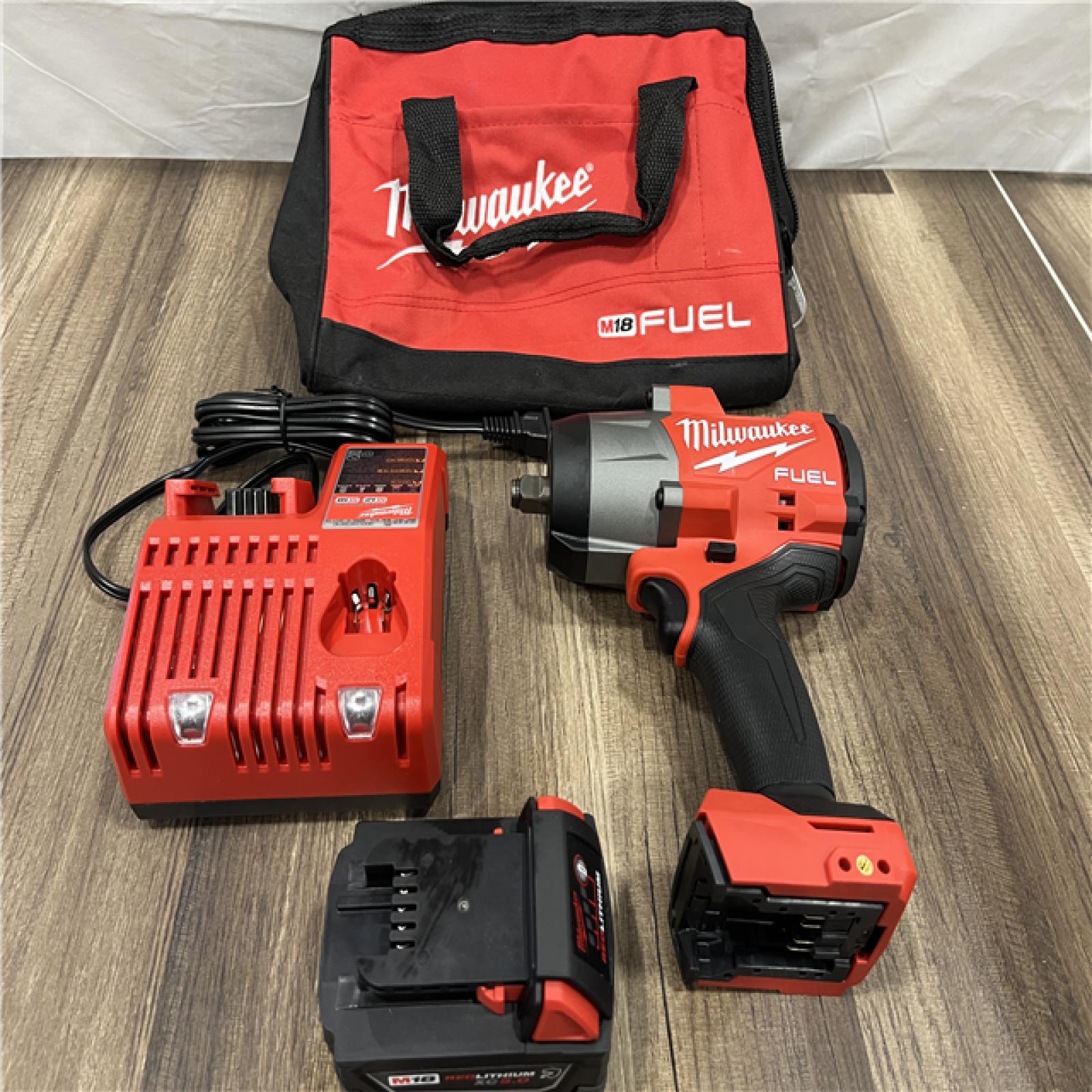 AS-IS Milwaukee M18 1/2 in. Cordless Brushless High Torque Impact Wrench Kit (Battery & Charger)