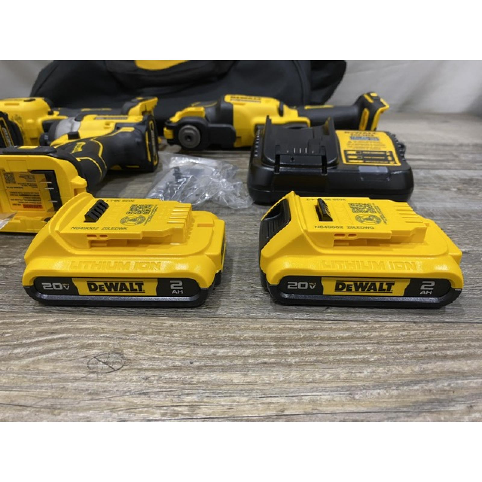 AS-IS DEWALT ATOMIC 20-Volt Lithium-Ion Cordless Brushless (4-Tool) Combo Kit
