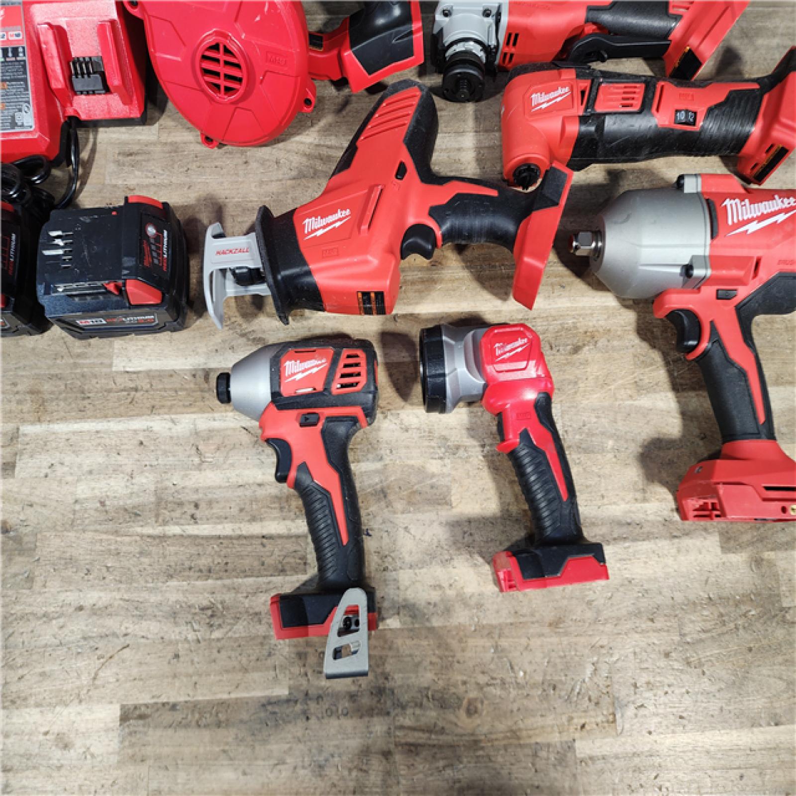 HOUSTON LOCATION - AS-IS MILWAUKEE 7 TOOL COMBO KIT W/ (2) BATTERY & CHARGER