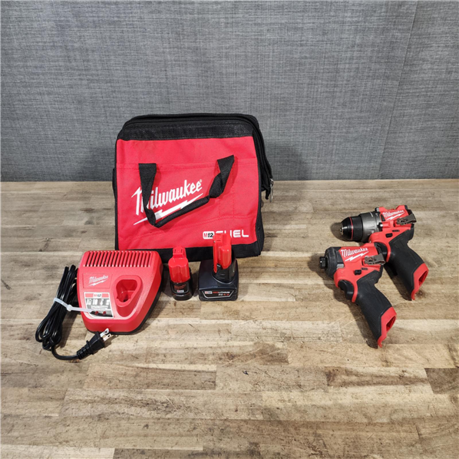 HOUSTON LOCATION - AS-IS Milwaukee FUEL 12-Volt Lithium-Ion Brushless Cordless Hammer Drill and Impact Driver Combo Kit
