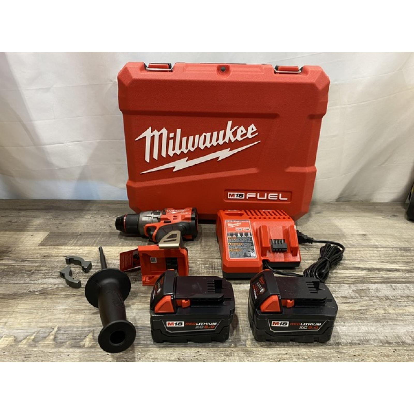 AS-IS Milwaukee FUEL 18V Lithium-Ion Brushless Cordless 1/2 in. Hammer Drill Driver Kit