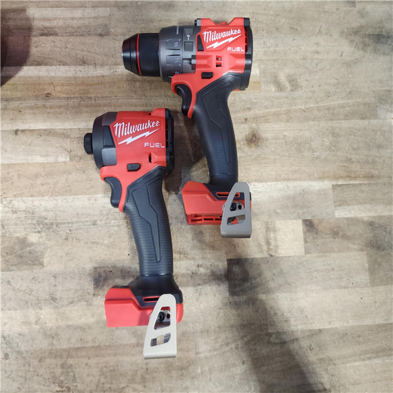 HOUSTON LOCATION - AS-IS (APPEARS LIKE NEW) Milwaukee  FUEL 18V Lithium-Ion Brushless Cordless Hammer Drill and Impact Driver Combo Kit