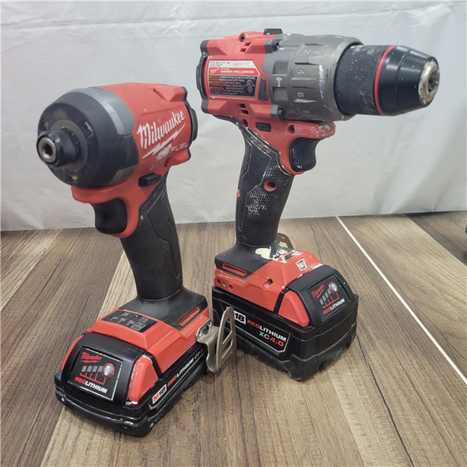 AS-IS MILWAUKEE M18 FUEL 18V Lithium-Ion Brushless Cordless Hammer Drill and Impact Driver Combo Kit (2-Tool) with 2 Batteries