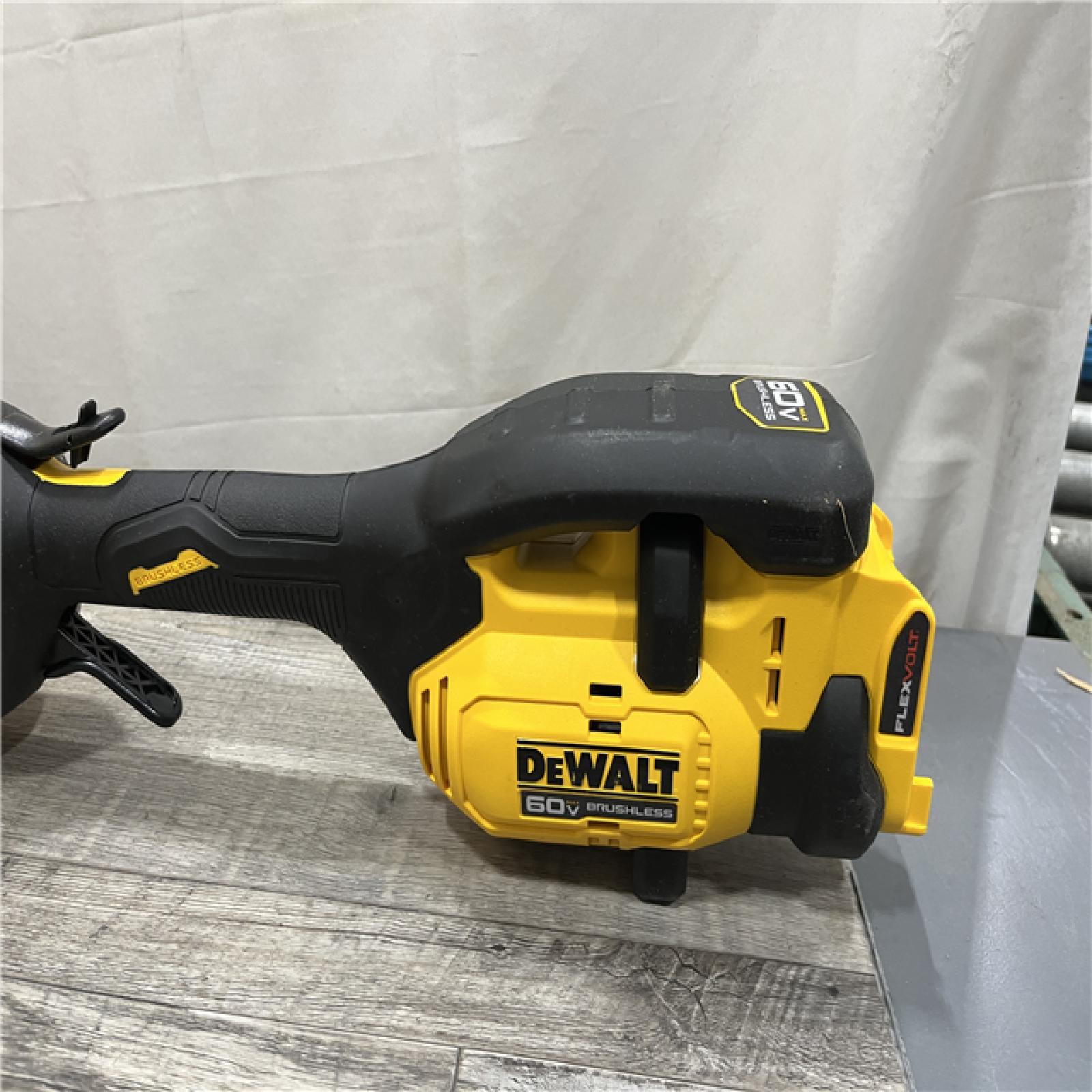 AS-IS DEWALT FLEXVOLT 60V MAX 17 in. Cordless Battery Powered Attachment Capable Trimmer Kit