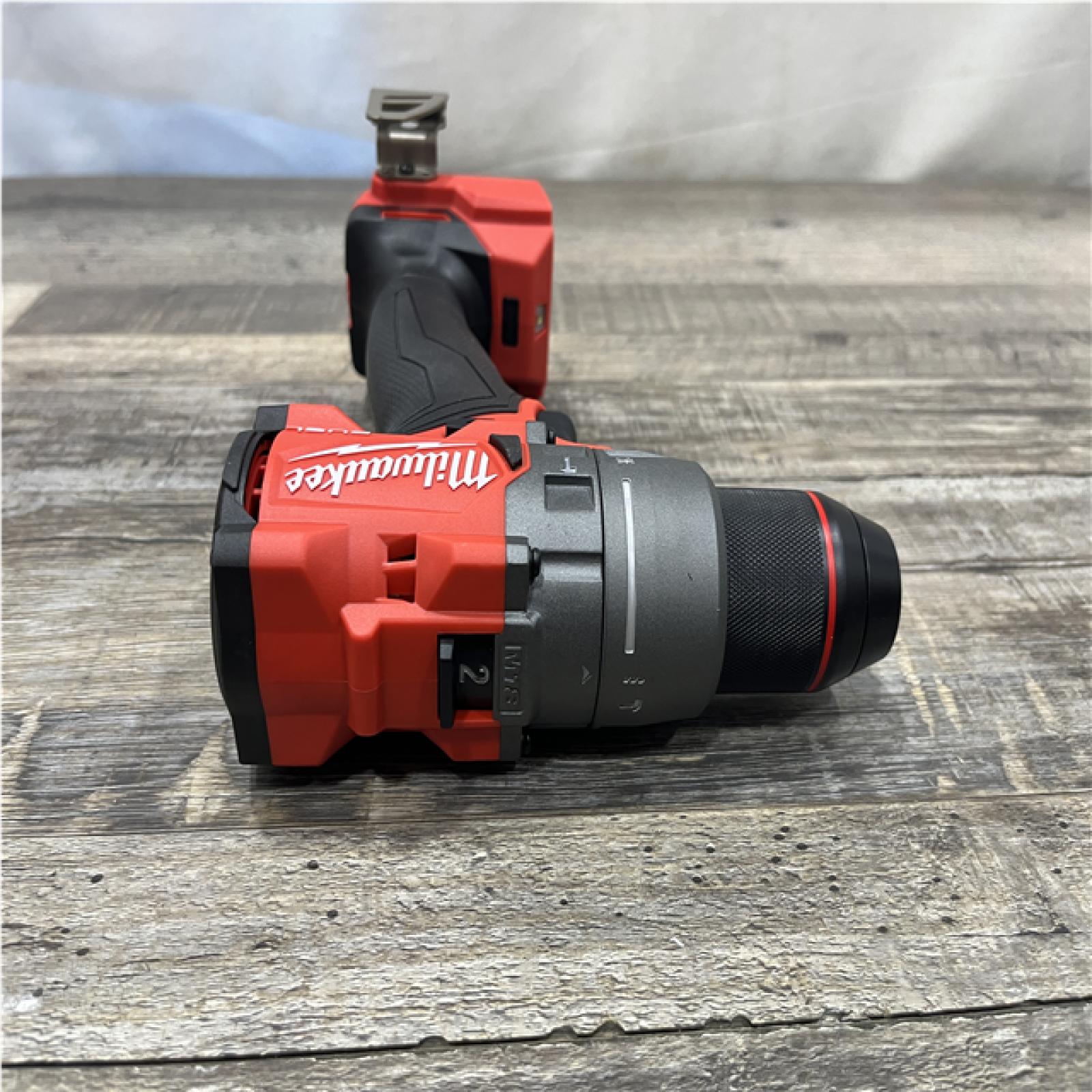 AS-IS Milwaukee FUEL 18V Lithium-Ion Brushless Cordless 1/2 in. Hammer Drill Driver Kit