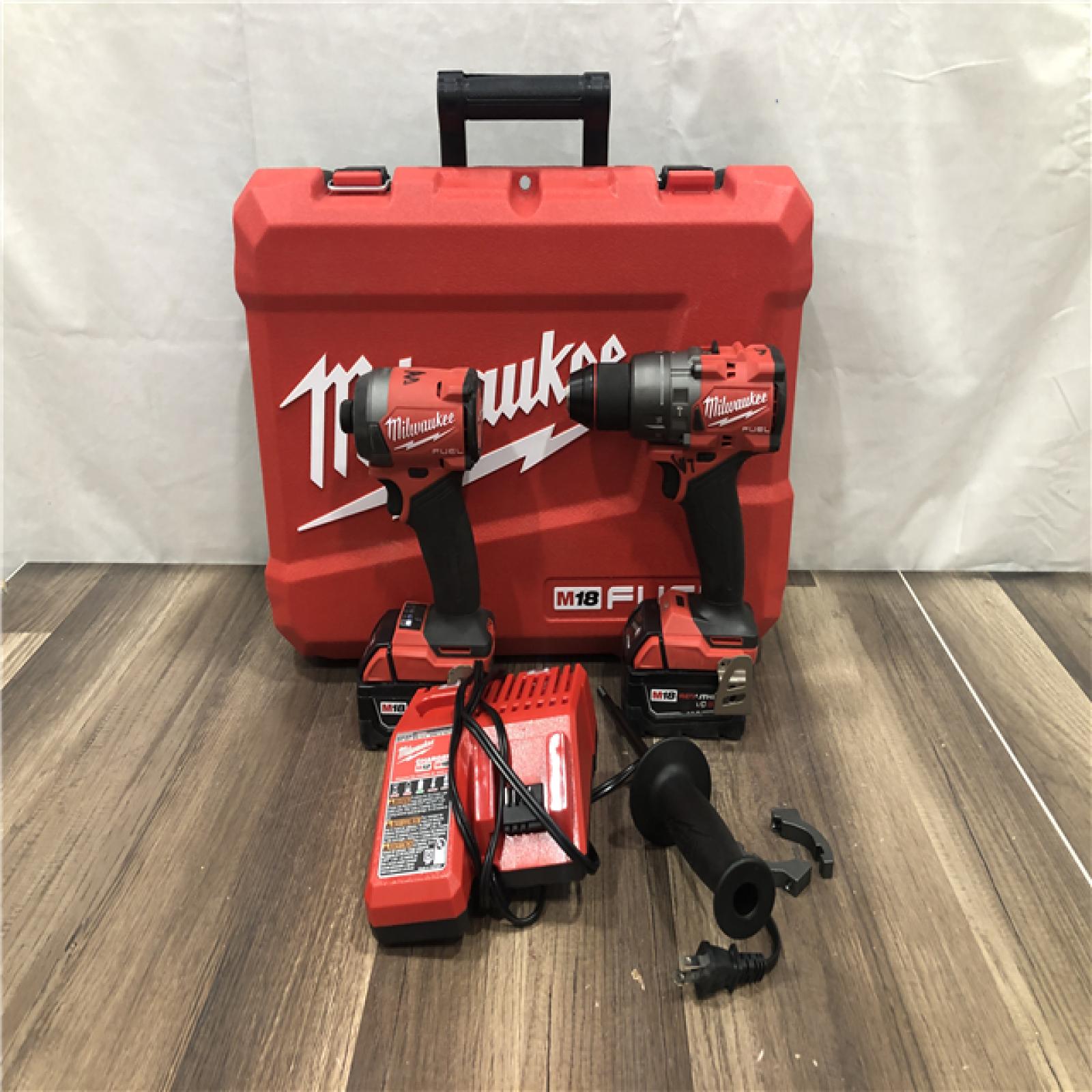 AS-IS Milwaukee FUEL 18V Lithium-Ion Brushless Cordless Hammer Drill and Impact Driver Combo Kit