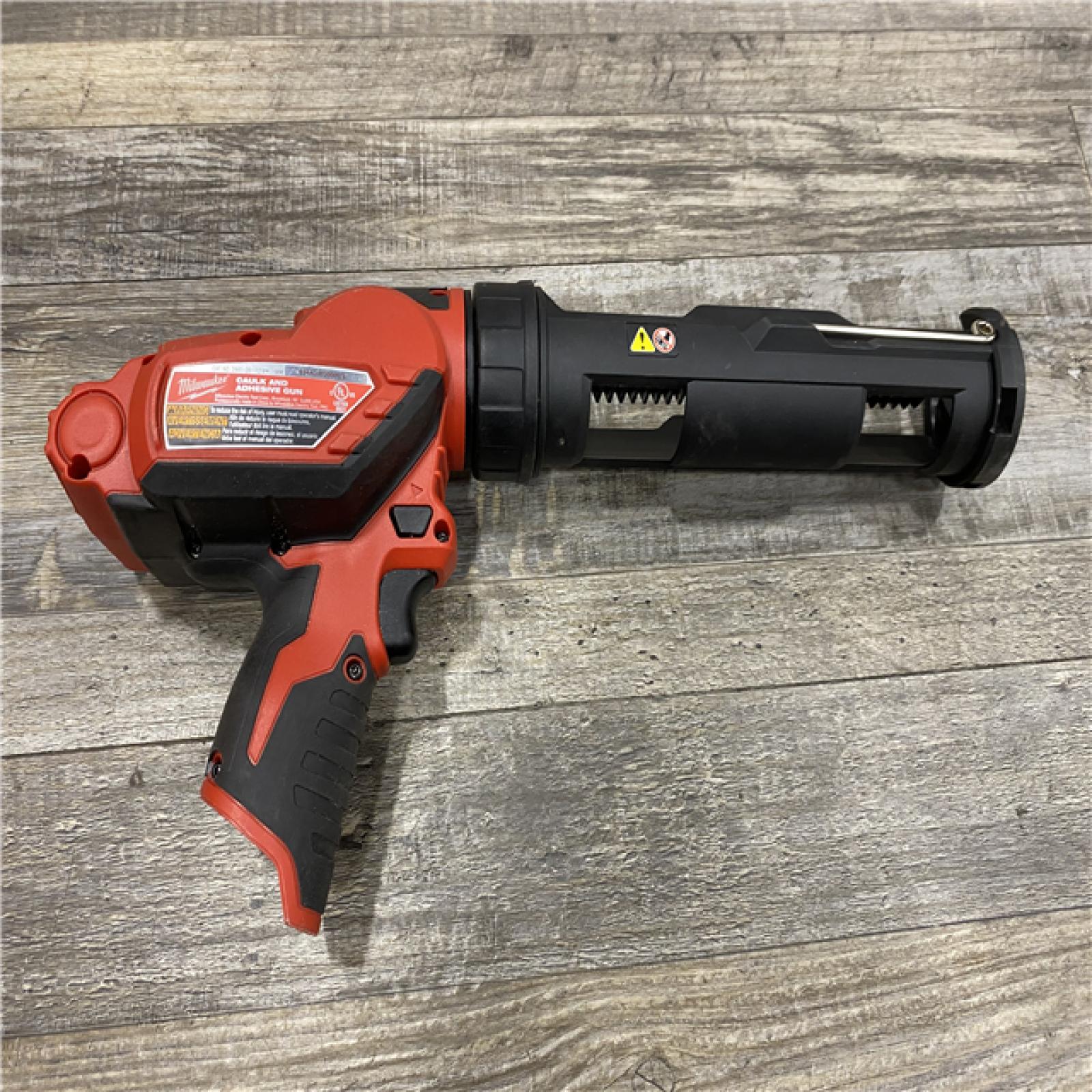 AS-IS Milwaukee 12V Lithium-Ion Cordless 10 oz. Adhesive and Caulk Gun (Tool-Only)