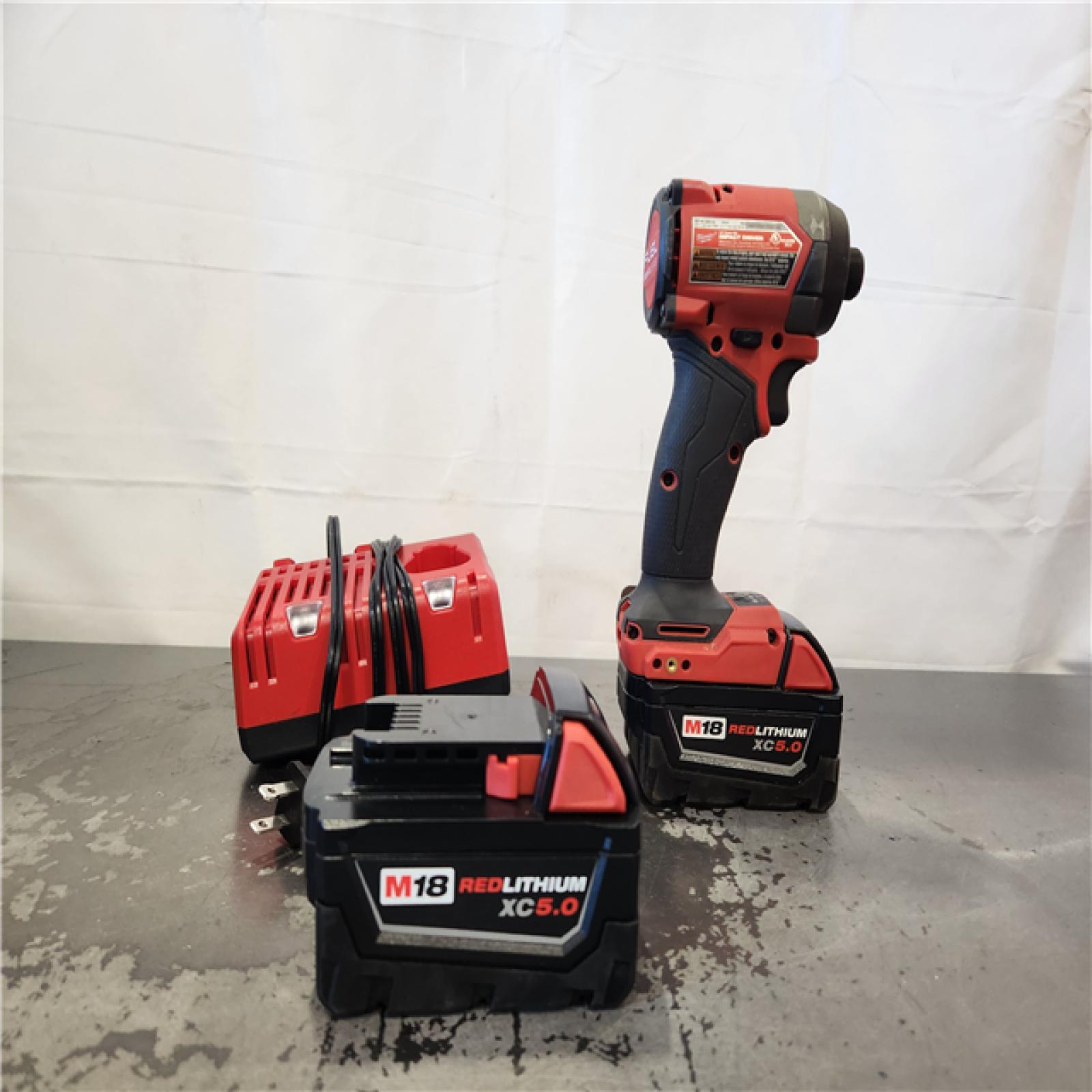 AS-IS- Milwaukee 18-Volt Lithium-Ion XC Starter Kit with Two 5.0Ah Batteries and Charger
