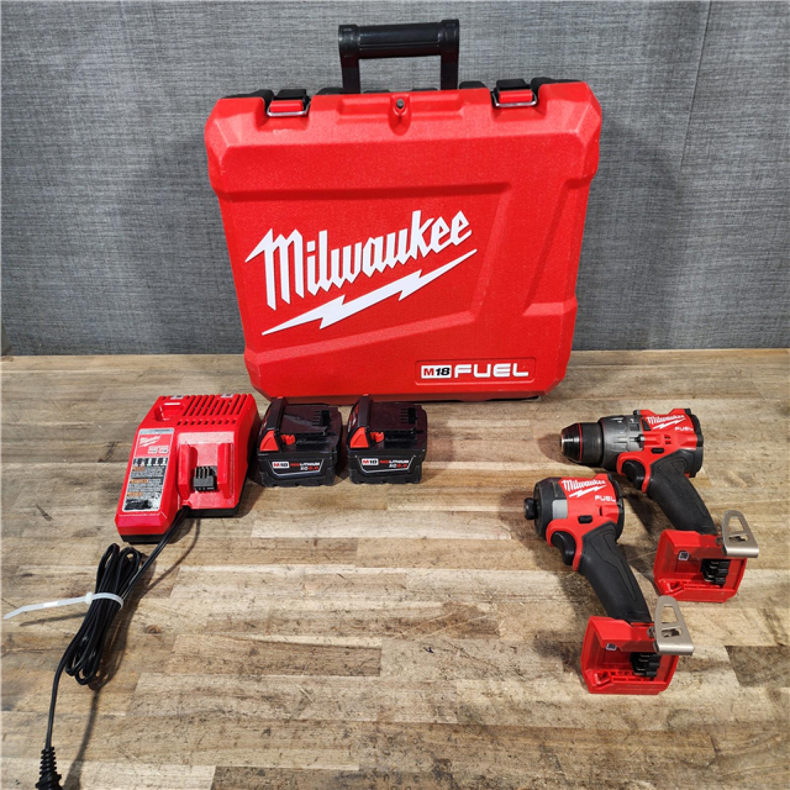 HOUSTON LOCATION - AS-IS Milwaukee FUEL 18V Lithium-Ion Brushless Cordless Hammer Drill and Impact Driver Combo Kit