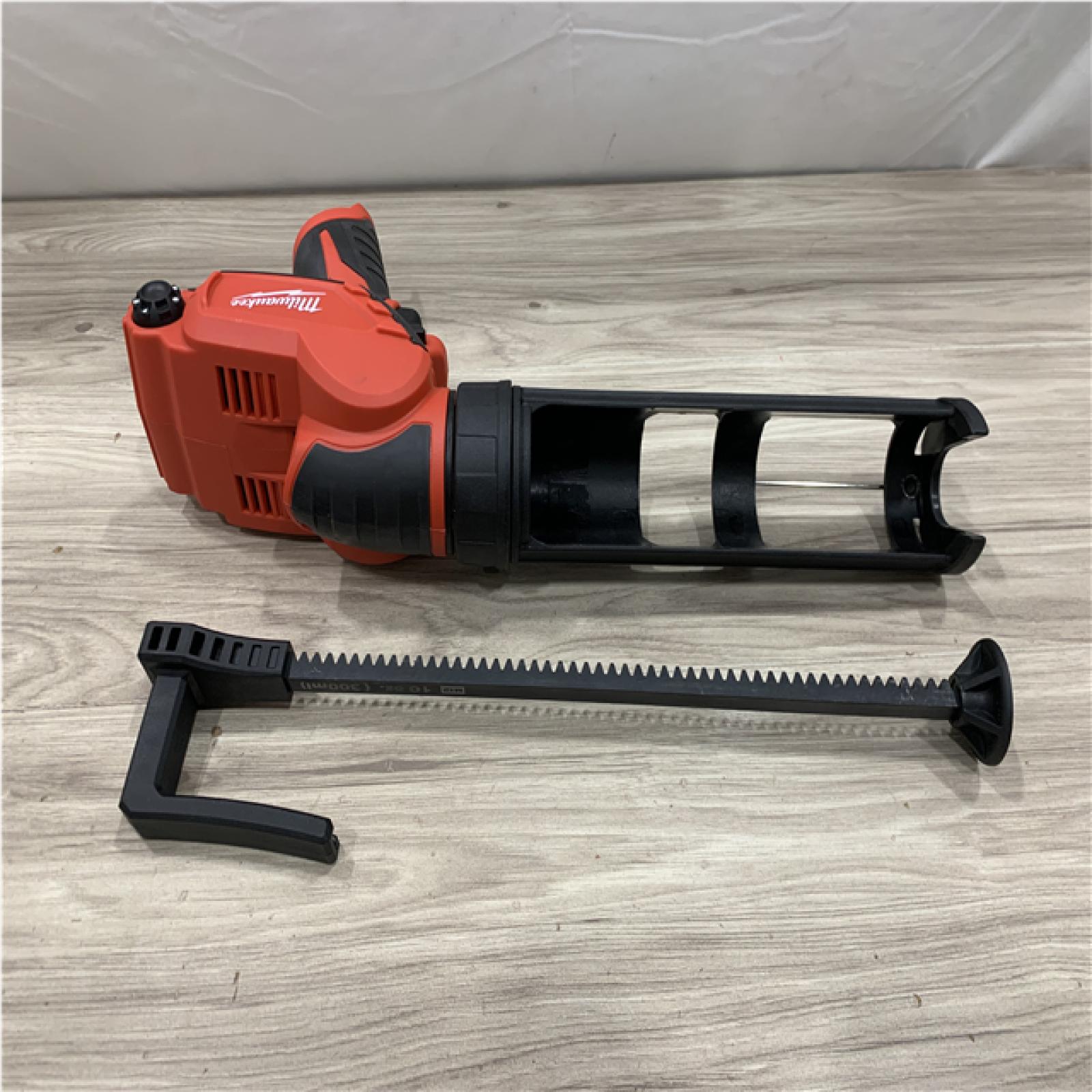 AS-IS Milwaukee 12V Lithium-Ion Cordless 10 oz. Adhesive and Caulk Gun (Tool-Only)