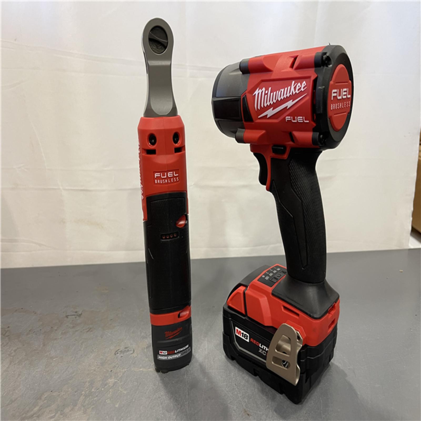AS-IS - Milwaukee M18 FUEL 18V Cordless Mid Torque 1/2 in. Impact Wrench W/ M12 FUEL 3/8 in. Ratchet & Battery/Charger Combo Kit