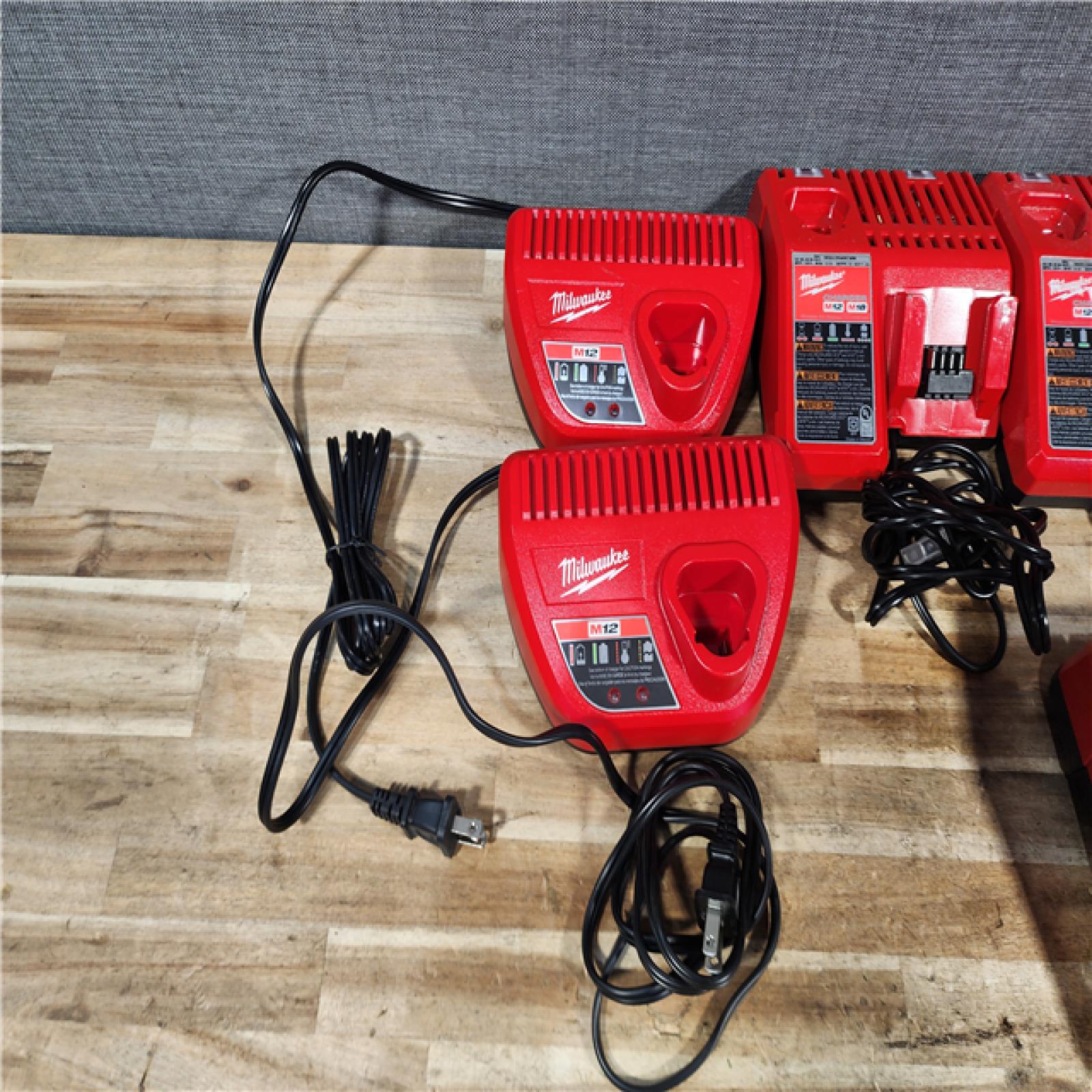 HOUSTON LOCATION - AS - IS MILWAUKEE BATTERY CHARGER PACK QTY - 7