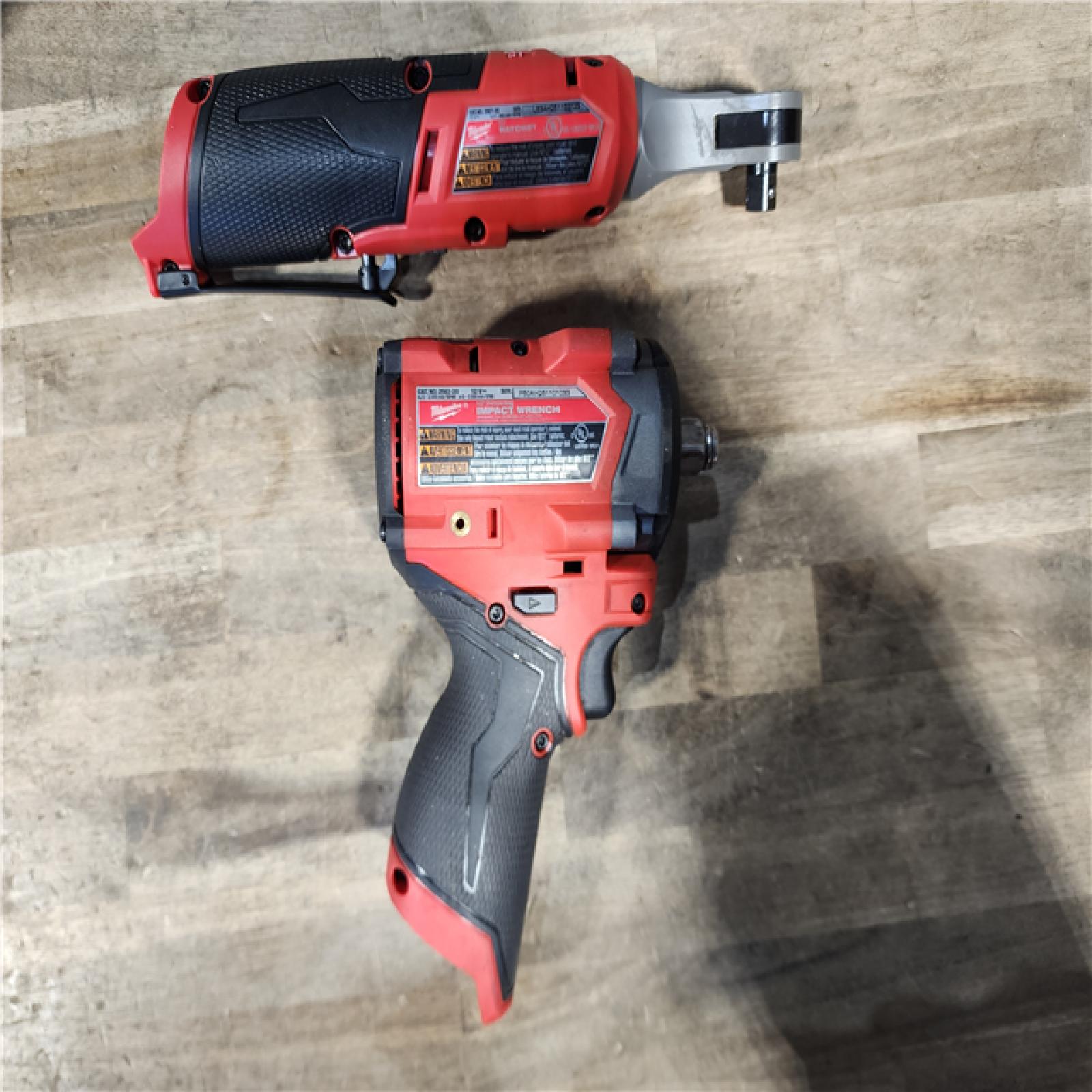 HOUSTON LOCATION - AS-IS MILWAUKEE 2 TOOL COMBO KIT W/ (2) BATTERY & CHARGER