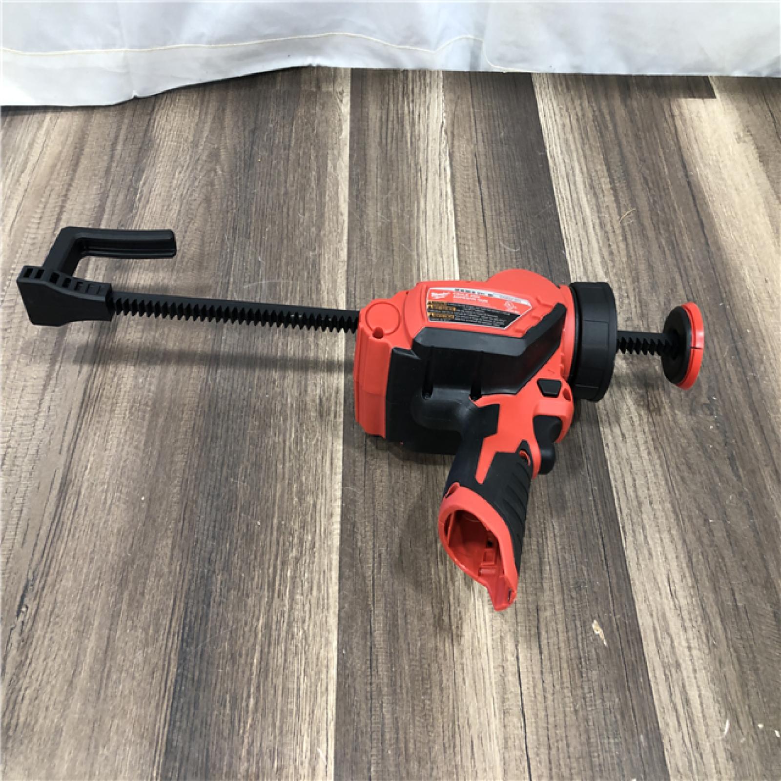 AS-IS Milwaukee 12V Lithium-Ion Cordless 10 oz. Adhesive and Caulk Gun (Tool-Only)