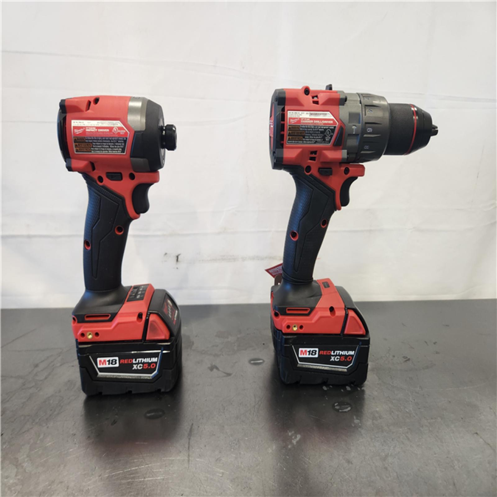 AS-IS- Milwaukee FUEL 18V Lithium-Ion Brushless Cordless Hammer Drill and Impact Driver Combo Kit