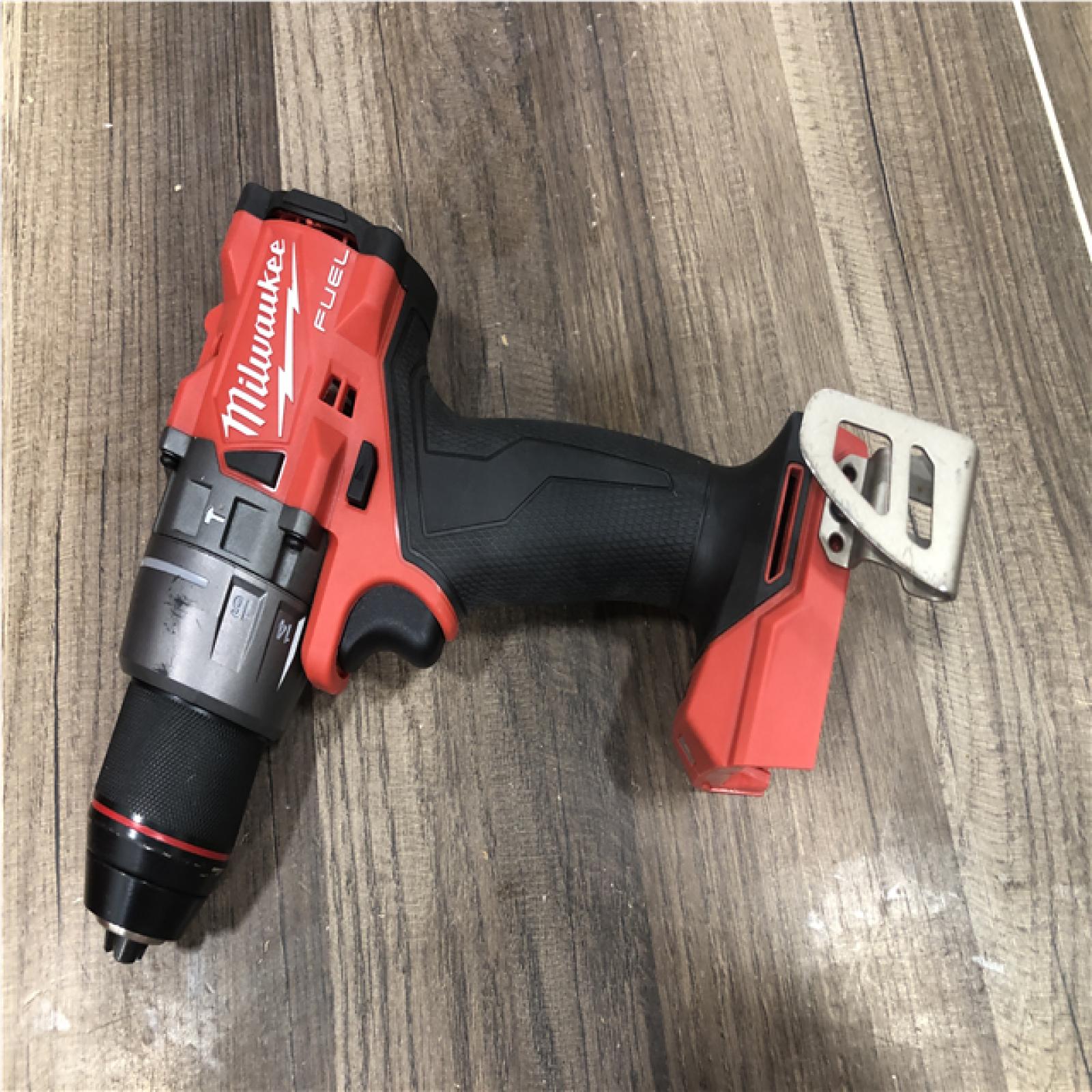 AS-IS Milwaukee FUEL 18V Lithium-Ion Brushless Cordless 1/2 in. Hammer Drill Driver Kit